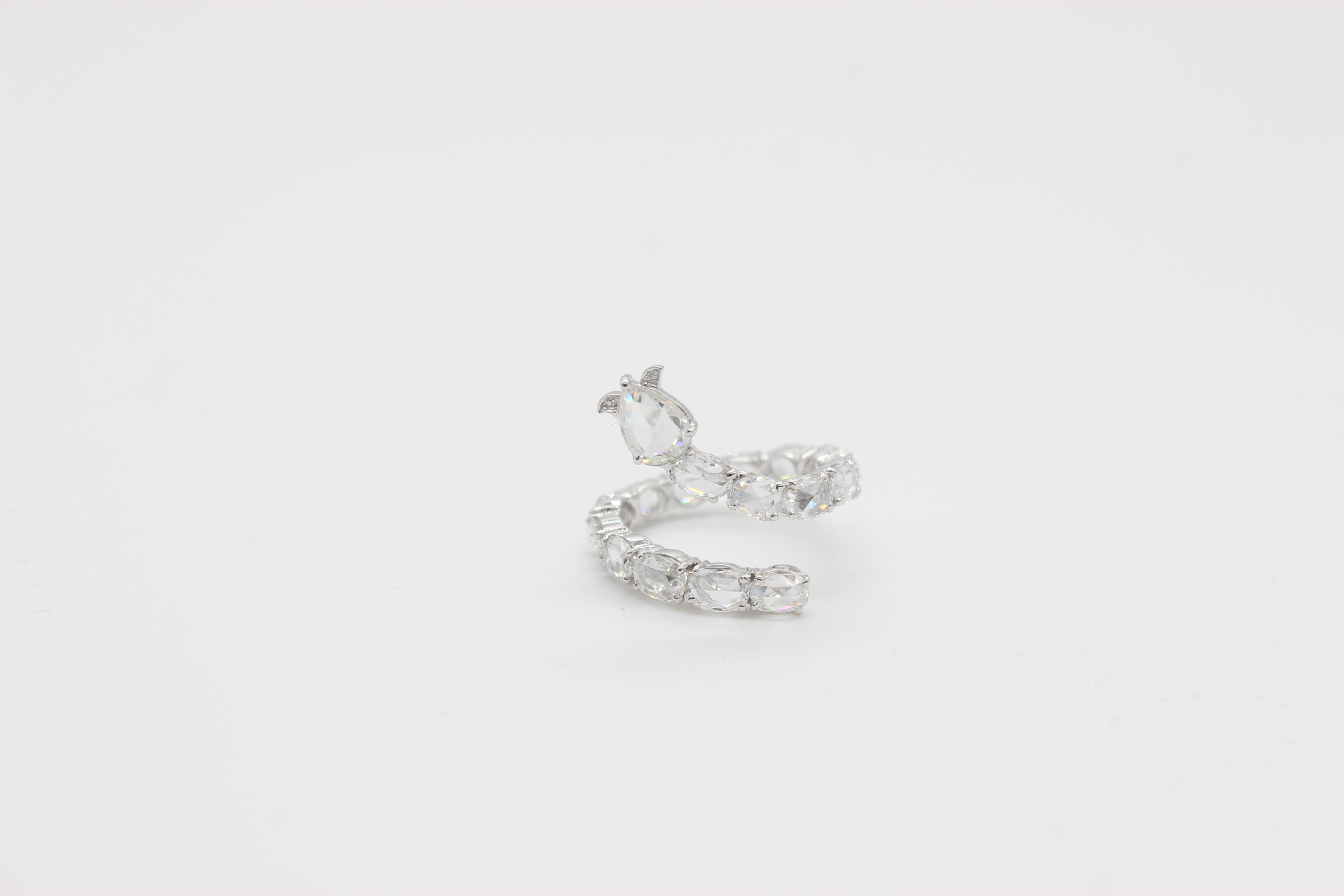 3.87 Carats of Diamond Rosecut Set in the Ring made in 18k White Gold 

An 18k White gold diamond ring by PANIM from the Serpenti collection. The ring is in the form of a serpent wrapping around the finger, comprising  Rosecut Diamonds graduating