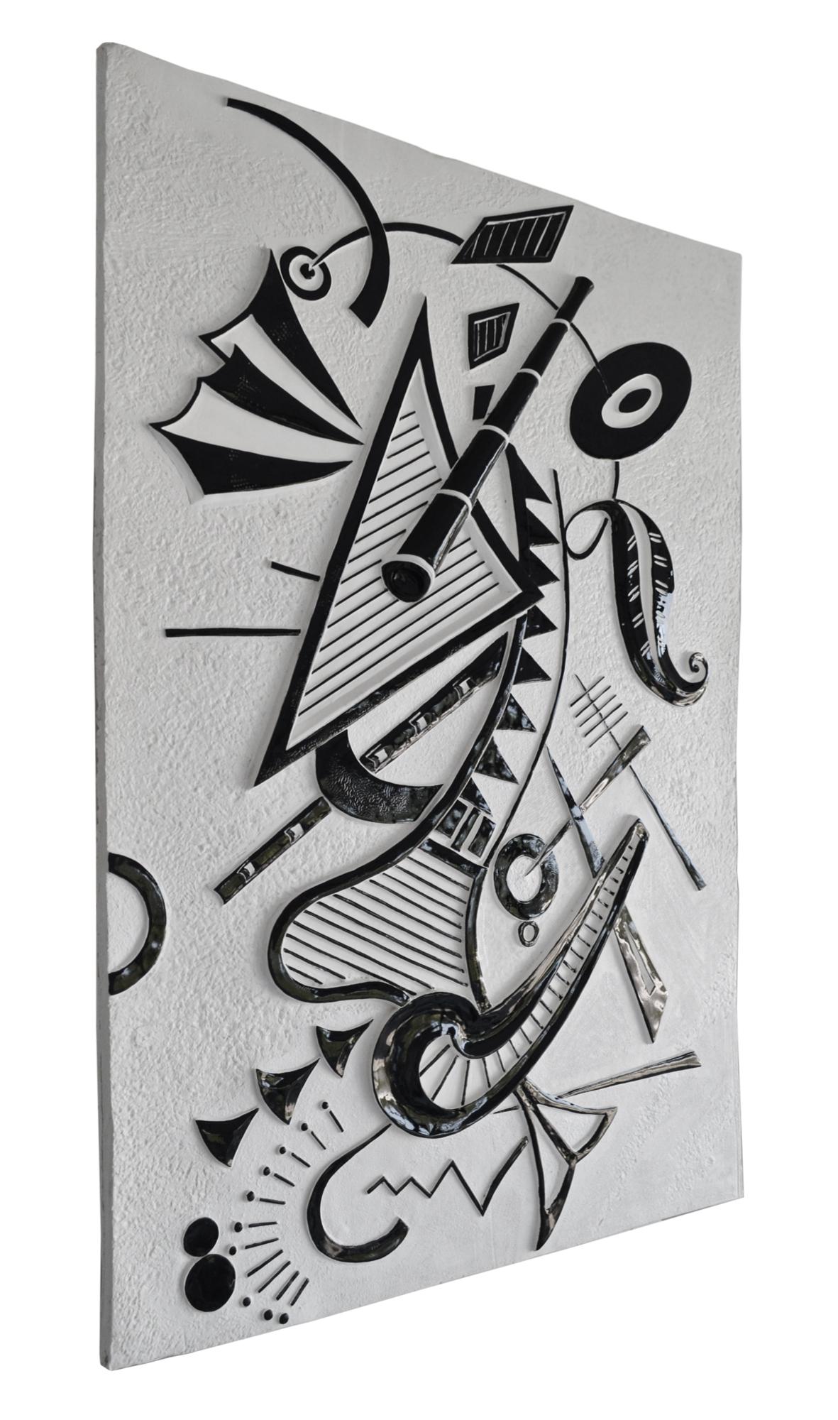  Black and white wall sculpture panel handmade in Italy by Cupioli.
 Subject: 