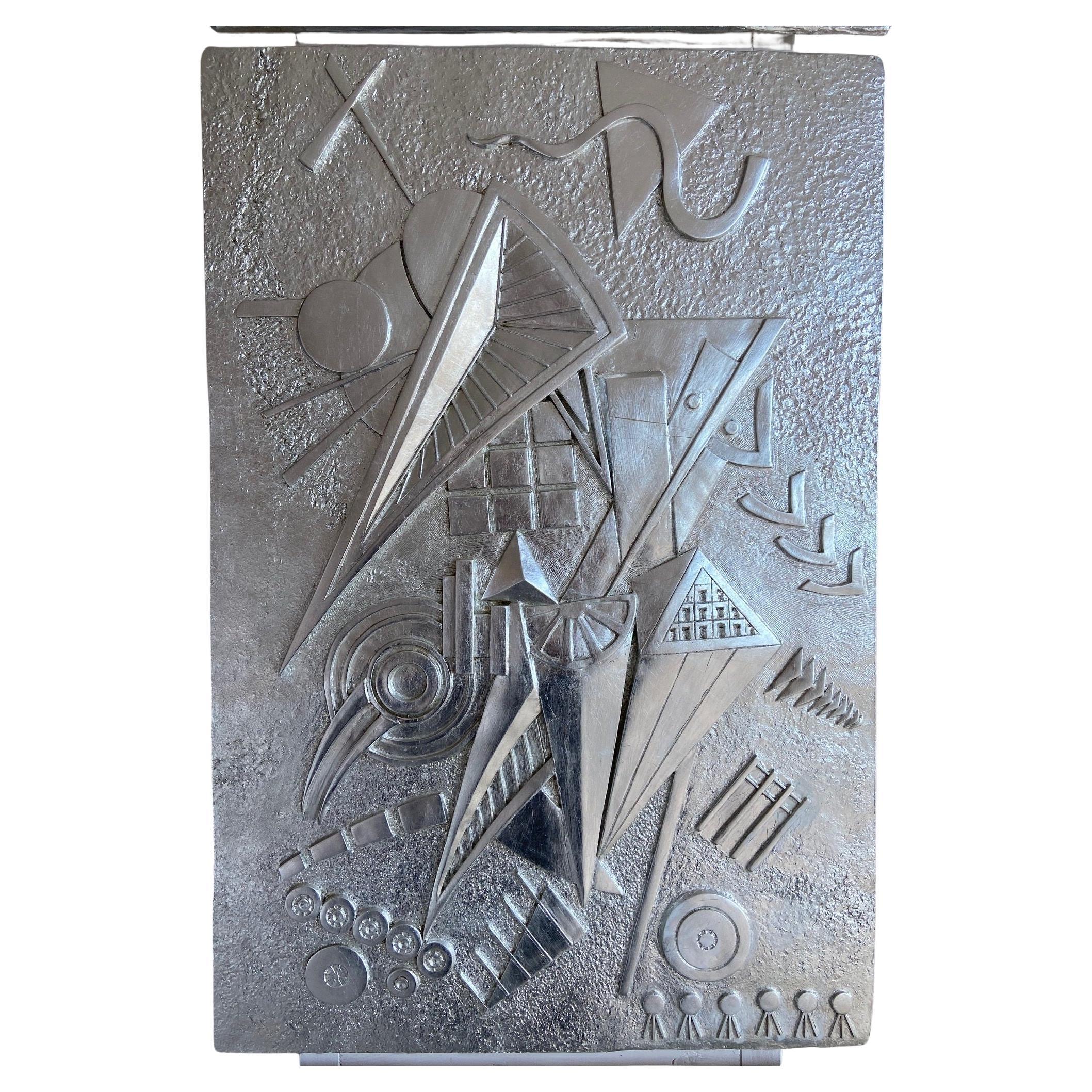  Sculptural wall panel in silver leaf handmade in Italy by Cupioli.
 Subject: 