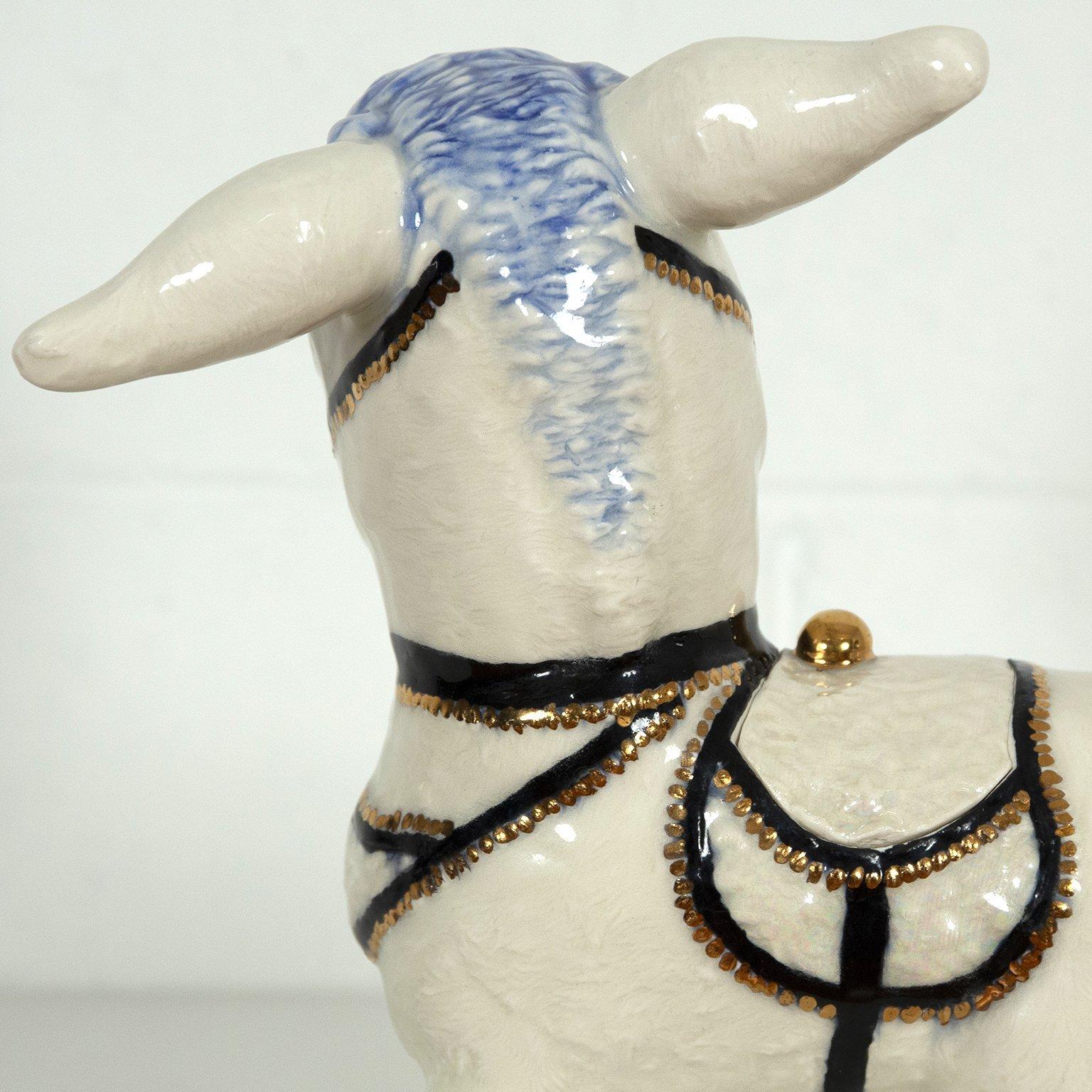 Working in the postmodern tradition of parody and appropriation, Pansy Ass Ceramics' creations are subversive and naughty with a touch of saccharine sweetness.

The Toronto-based duo, Kris Aaron and Andrew Walker, started hijacking bric-a-brac