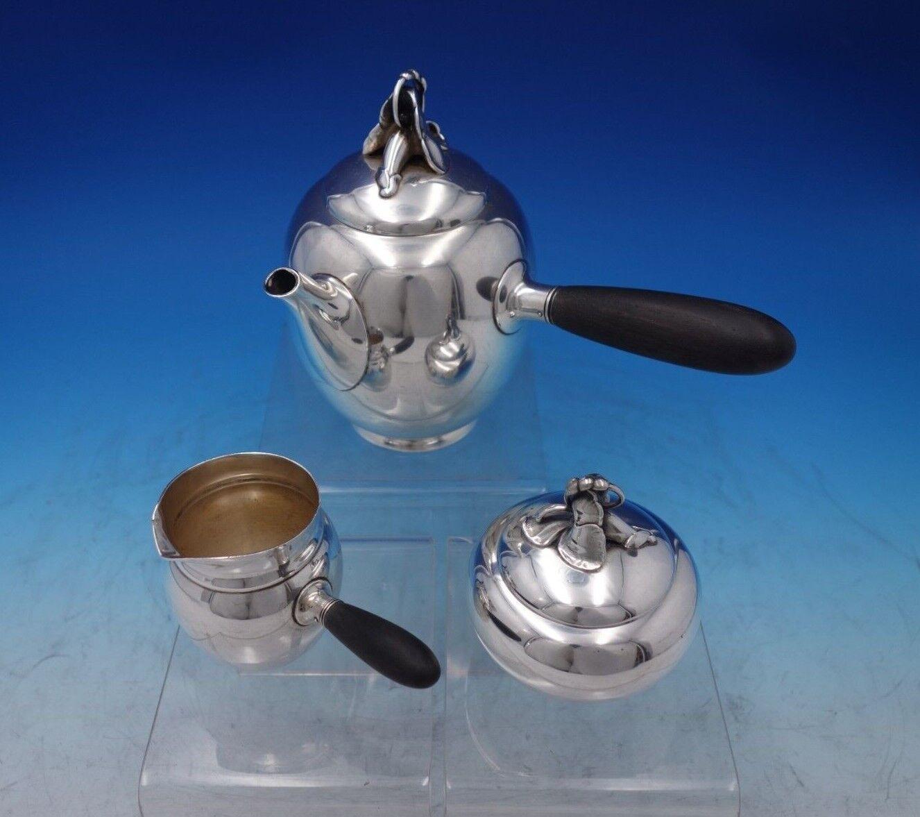 Pansy by Gorham

Spectacular Pansy by Gorham sterling silver three-piece coffee set. This set includes:

1 - Coffee Pot (with ebony handle): Holds 1 1/2 pints, measures 6