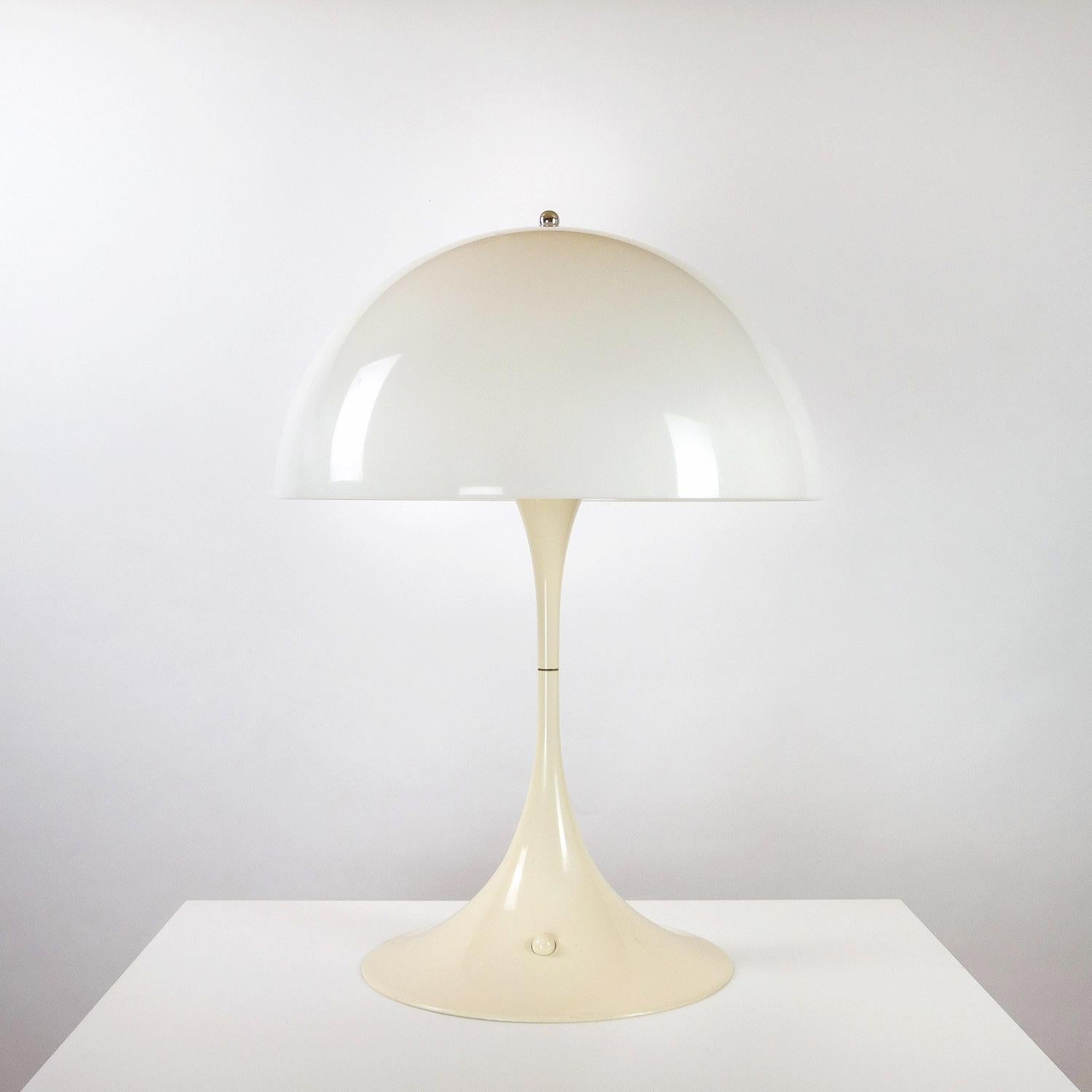An early Verner Panton Panthella table lamp with opal acrylic shade, plastic tulip base and metal stand. Designed by Panton in 1971 for Louis Poulsen, Denmark, the Panthella is instantly recognizable. Possibly his most iconic piece.