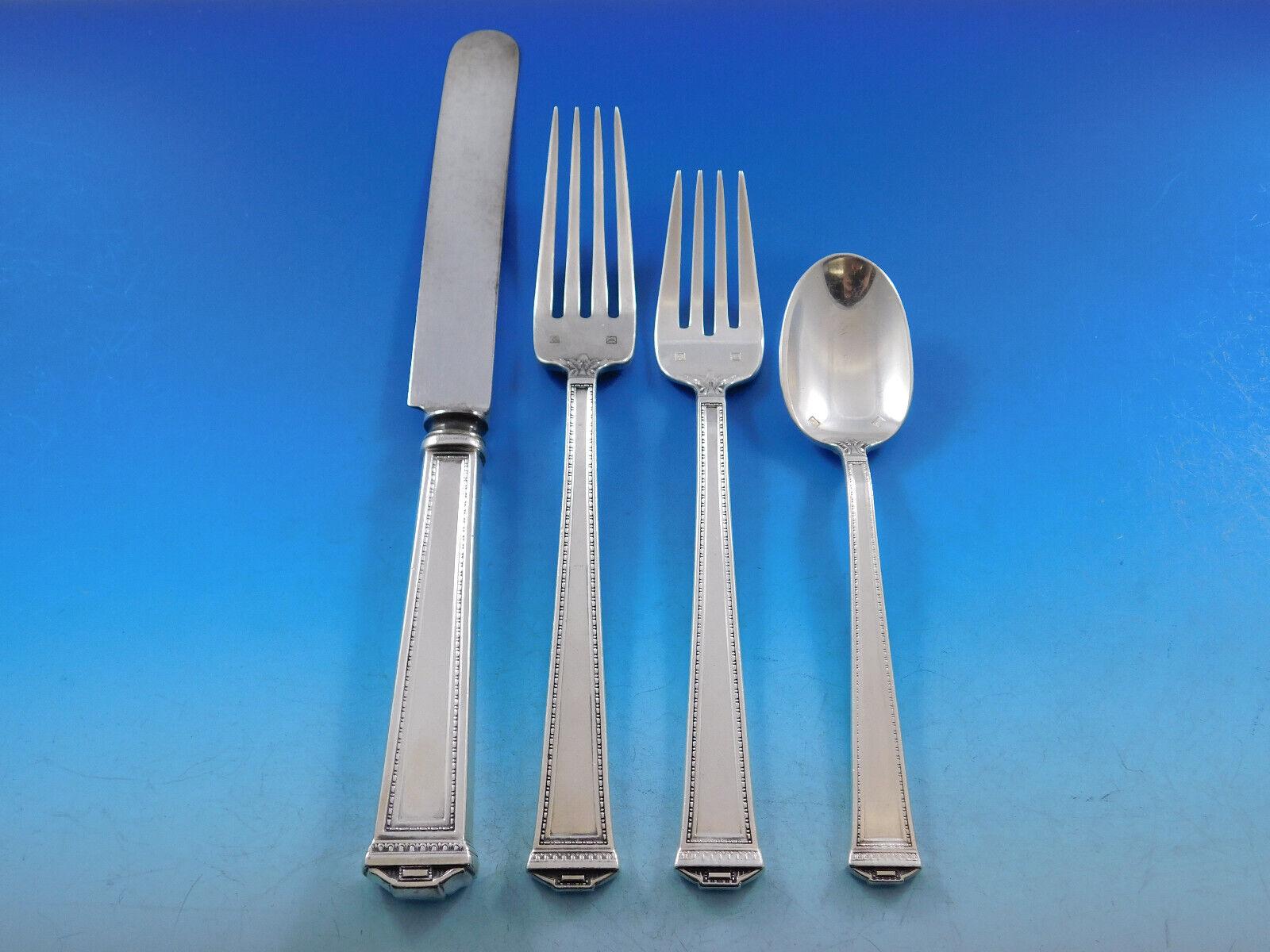 Dinner size pantheon sterling silver flatware set - 60 pieces. All of the pieces were made by Tuttle except for the dinner knives, which are the earlier version of this pattern by International. This set includes:

12 Dinner Size Knives, 10