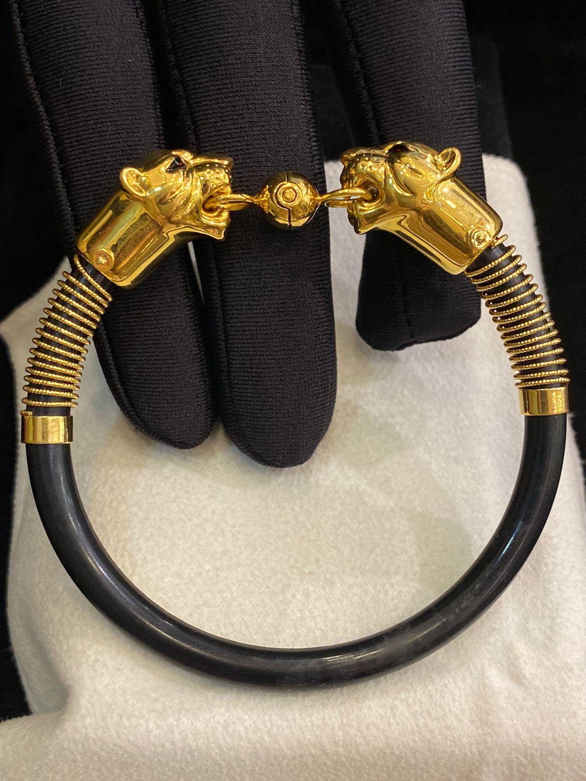 Exclusive panther bracelet in 22k gold and leather. Handmade Jewels. Top quality.