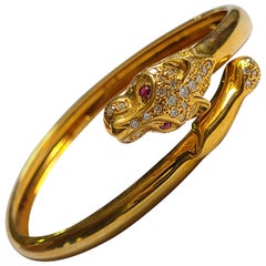 Panther Design 18 Karat Gold Bangle/Bracelet with Diamond and Color Stone