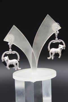 Panther earings 18 k gold diamond onyx emerald