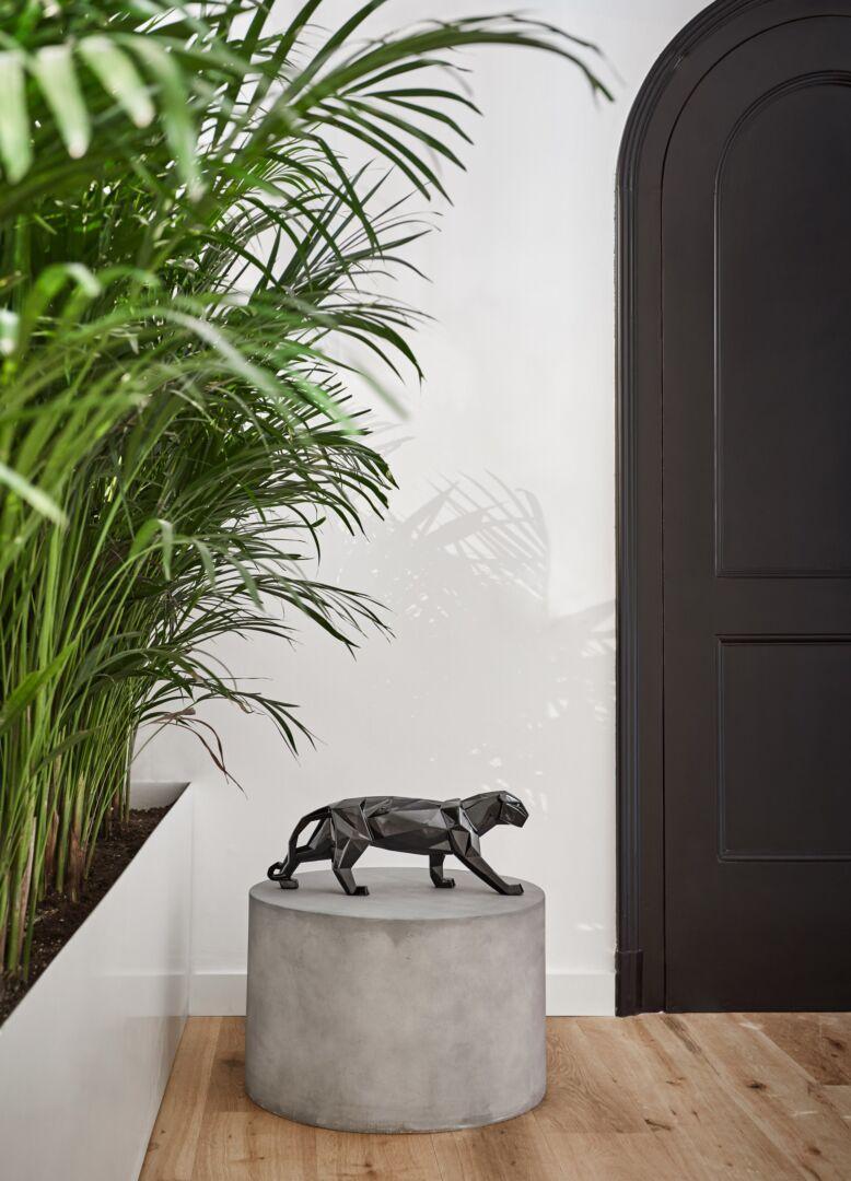 Panther from the Origami collection made in glazed black porcelain. Panther is a sculpture from the Origami collection, inspired by this Japanese art form which consists in making objects by folding paper. Finished in glazed black porcelain, the