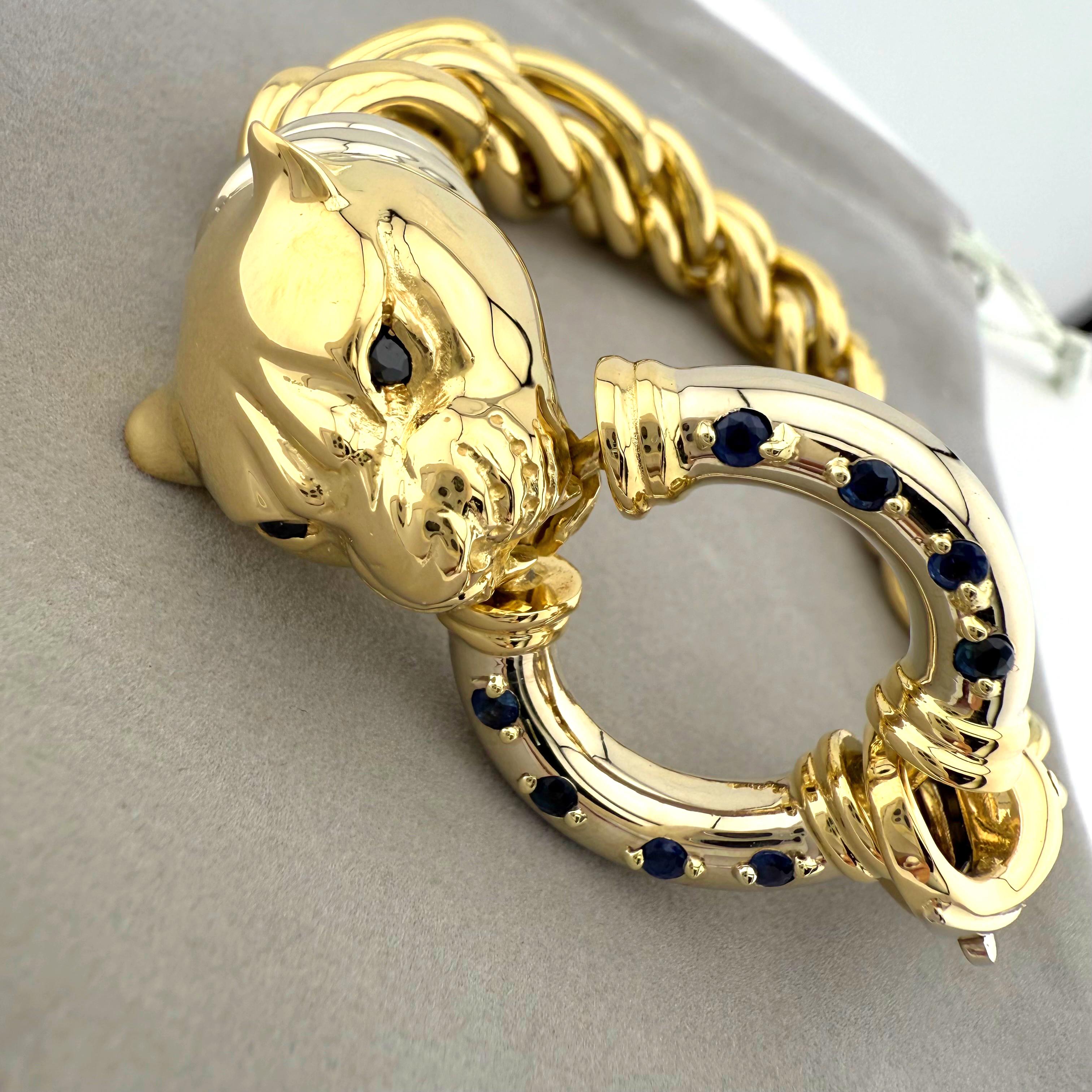 Pulsera Cabeza de Pantera con Zafiros Azules 
Estilo:  Pulsera
Metal:  Oro blanco y amarillo de 18k
Tamaño:  7,75' Pulgadas 
Hallmark:    18Kt AU ITALIA
Incluye:   Elegante caja para pulseras
Sku#114934TBJ05062025