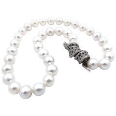 Vintage Panther-Pattern Diamond Pavé and Onyx Gold Clasp White South Sea Pearl Necklace