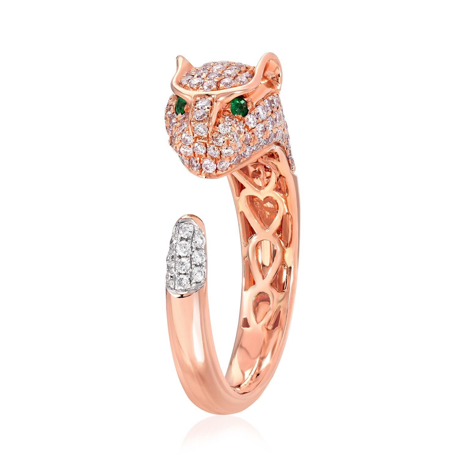 Panther ring mini, in 18K rose gold, set with a total of 162 natural pink round diamonds weighing 0.80 carats, 10 round white diamonds weighing 0.06 carats on the tail end, and 2 round emeralds weighing 0.02 carats in the eyes.
Panther ring size