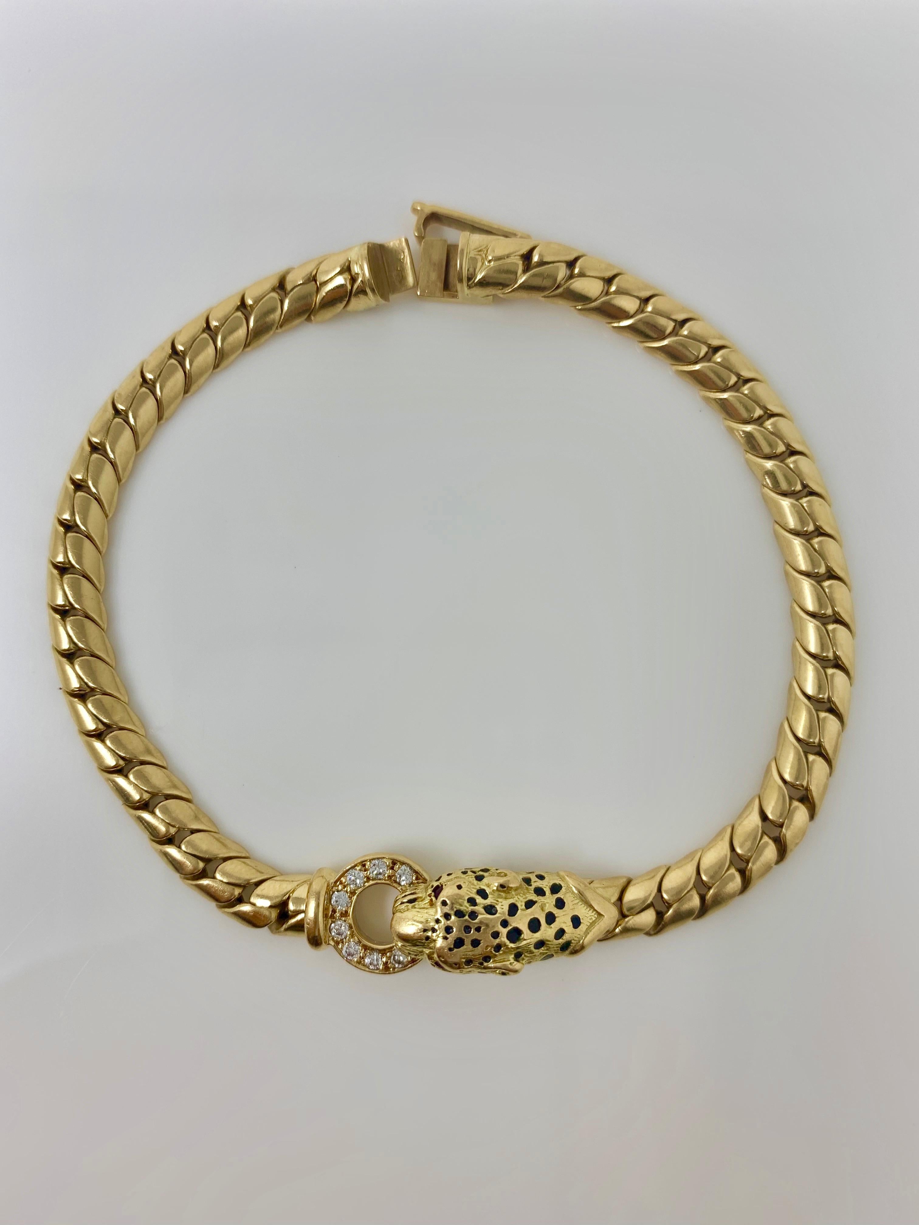 This unique, flexible and one of a kind panther diamond and yellow gold bracelet is beautifully handcrafted in France. 
Diamond weight : 0.20 carat 
Metal : 18K yellow gold
Measurements : 7 1/2 inches 
 
