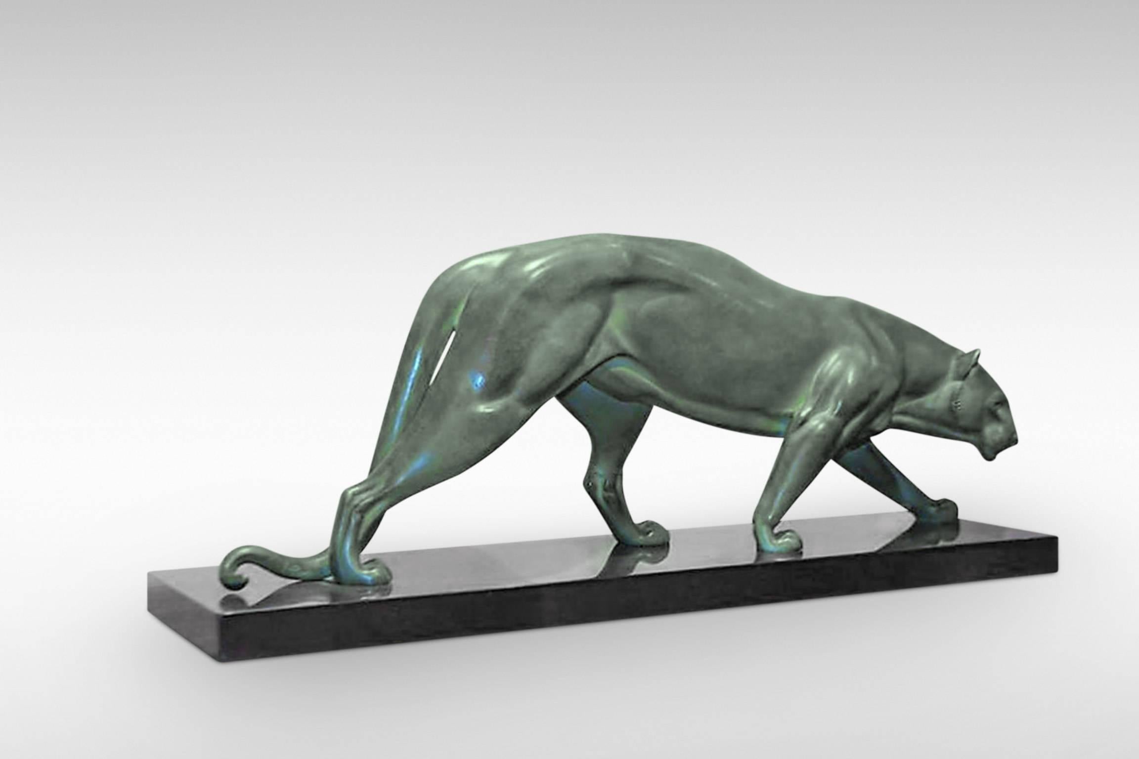 'Panthere' by Irenee Rene Rochard is an original Art Deco bronze sculpture of a large walking panther. Signed to the tail by the sculptor,
circa 1930.