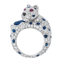 Retro Panthere De Cartier 2.90 Carat Oval Sapphire, Diamond and Ruby Ring in Platinum