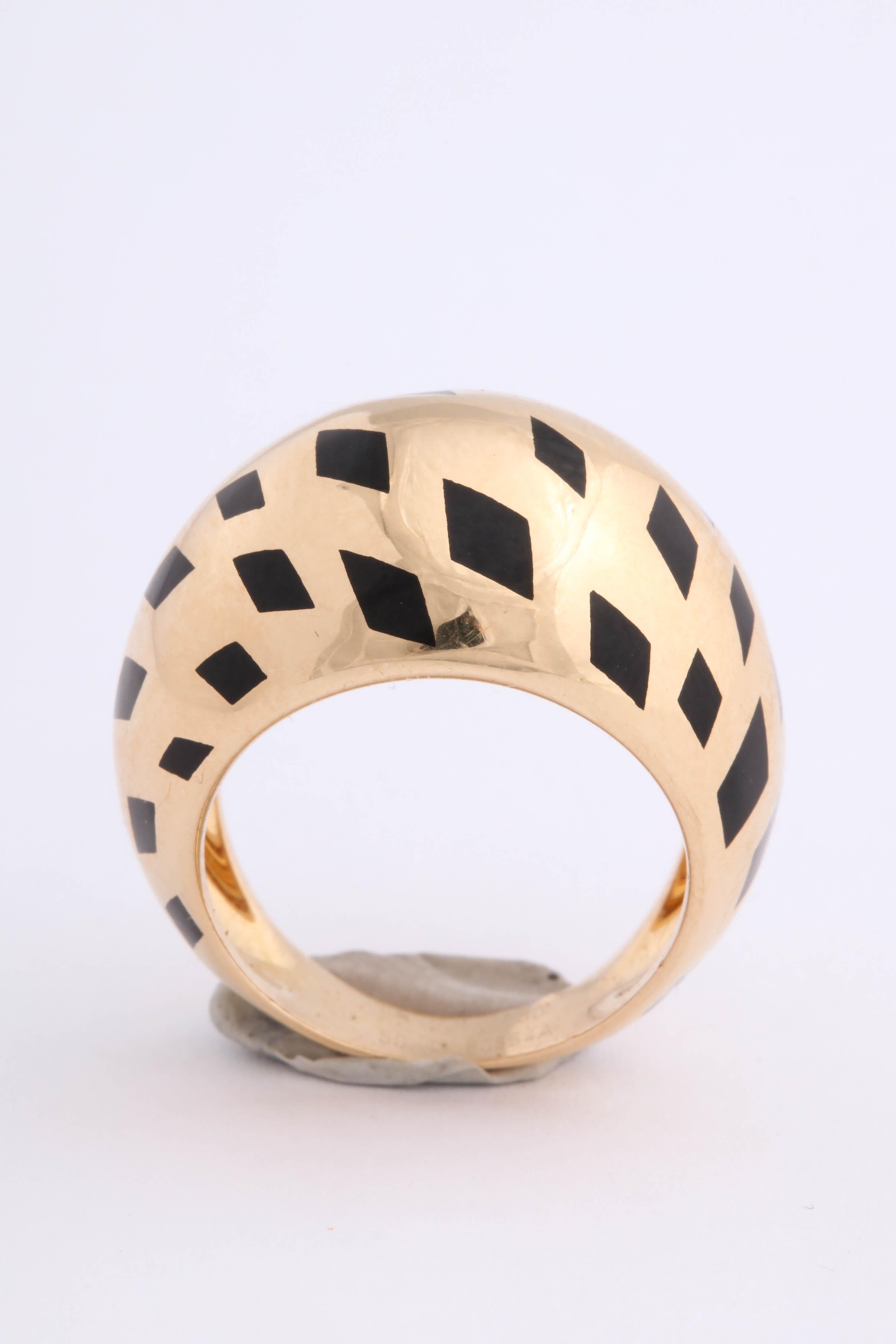 Chic Cartier pinky ring.  Highly Polished Dome with black enamel Leopard marks on a diagonal.  Made in France with French Hallmarks. Size 5.25.  Very chic - Ooh la la!
