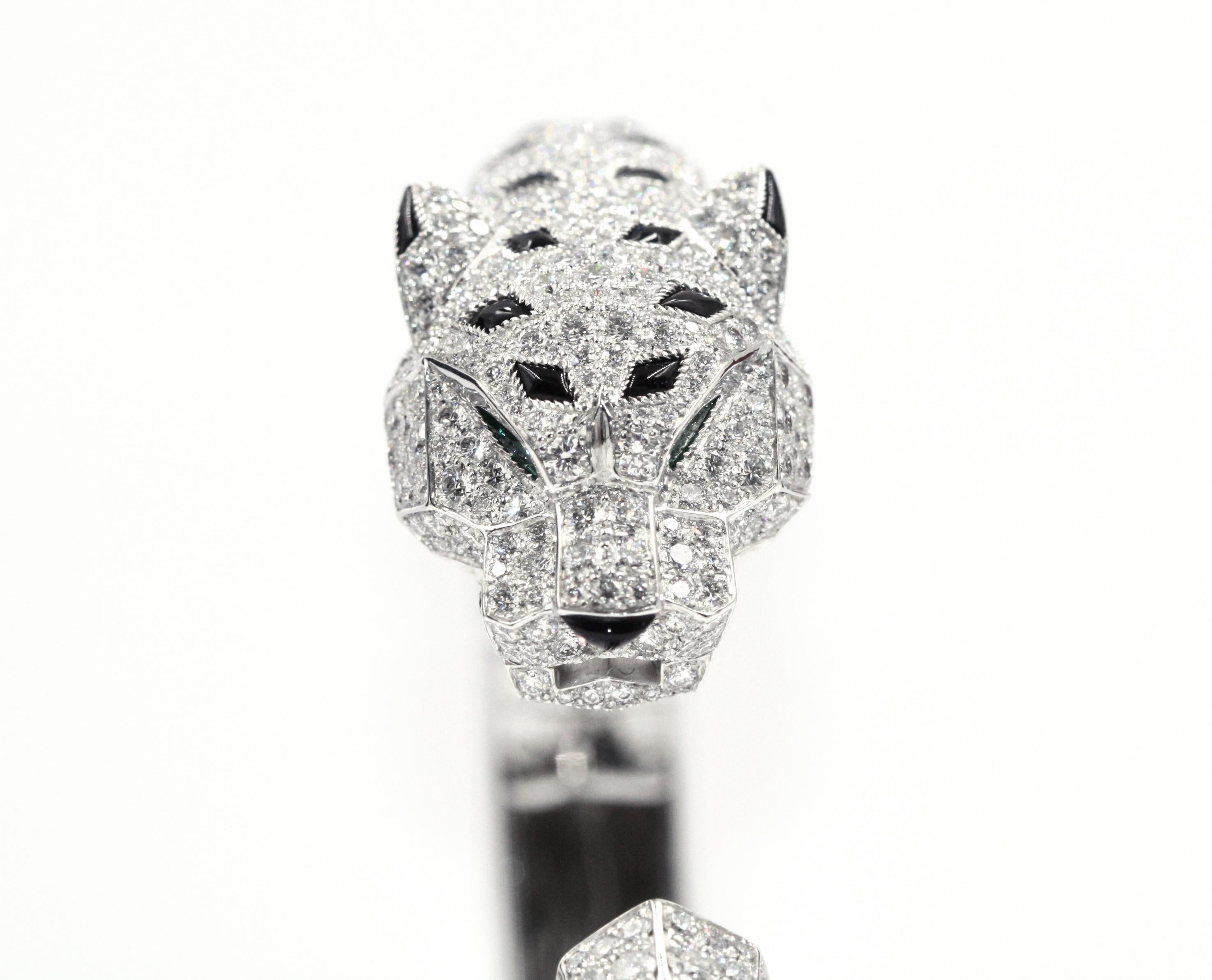 Panthère de Cartier Bracelet, 18 Karat White Gold, Diamonds, Emeralds, Onyx In Excellent Condition For Sale In New York, NY