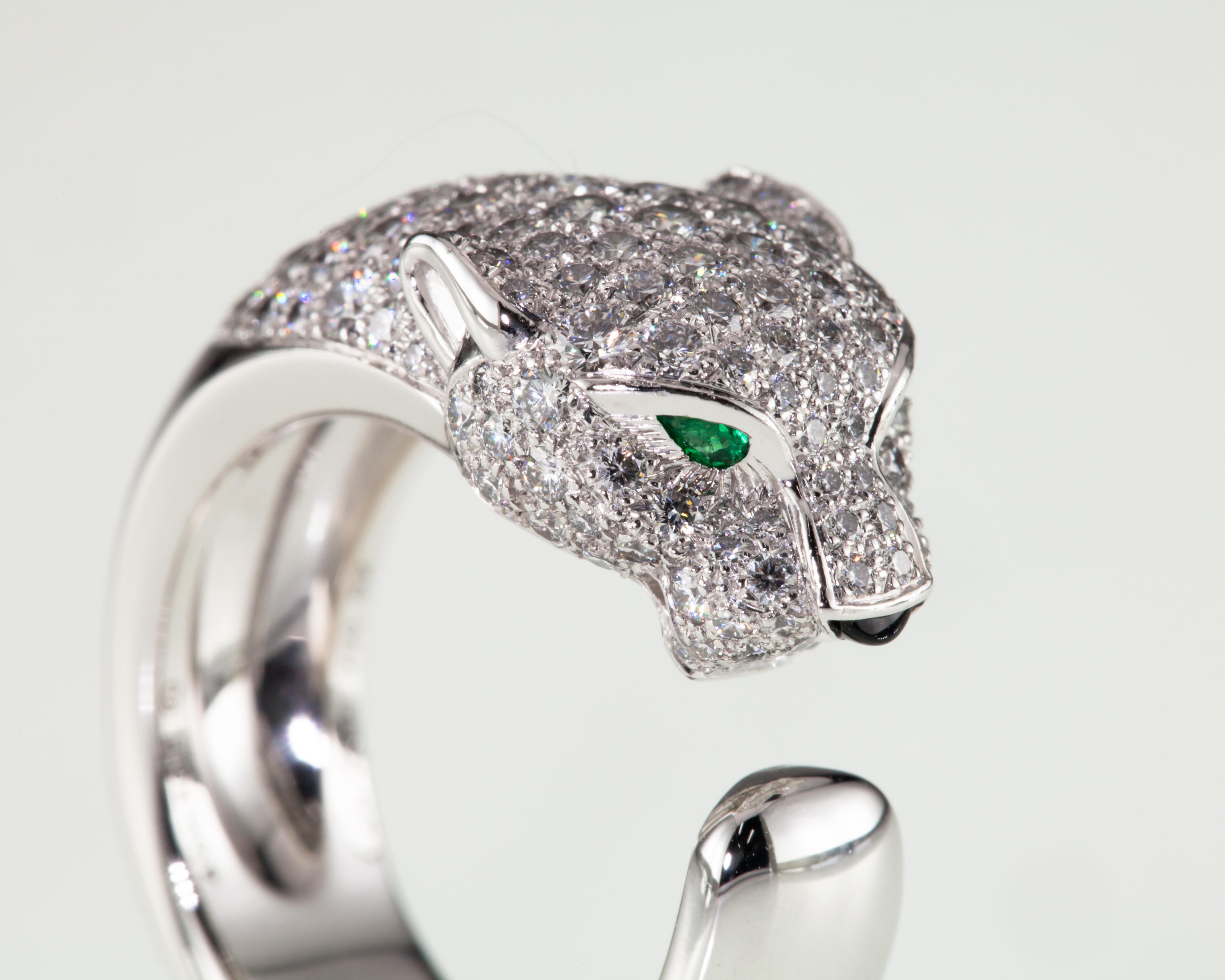 Gorgeous 18k White Gold Band Ring by Cartier
Features 1.15 Carats of Pave Collection Quality Diamonds
Emerald Eyes
Onyx Nose
Size 52 (US Size Appx 6.25)
Total Mass = 14.3 grams
Retails for $24,000
A Great Deal!