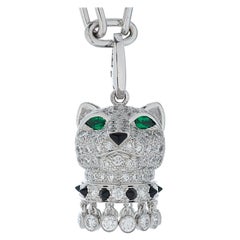 Cartier Pendentif tête de panthère en or 18 carats, diamant, émeraude et onyx