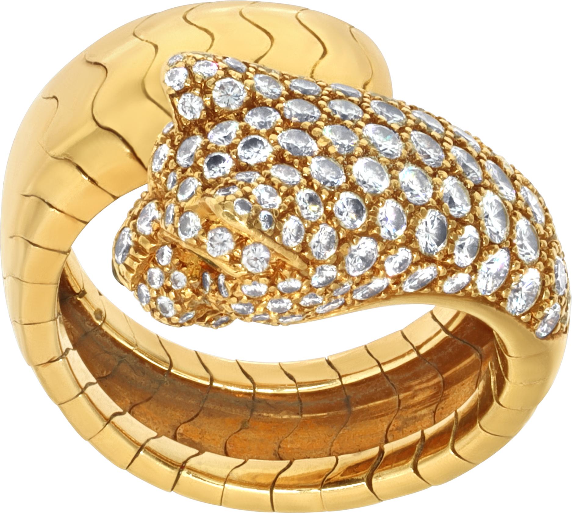 Panthere De Cartier 18k yellow gold diamond panther head ring with emerald eyes and onyx nose. Round brilliant cut diamonds E color, VVS1 clarity total weight approx. 1.50 carats. Ring is flexible. Ring size 50 (USA 7). Box and papers. Circa 2003.
