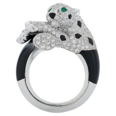 Anillo Panthere De Cartier de diamantes, ónice y esmeralda de 18 kwg con estuche Cartier