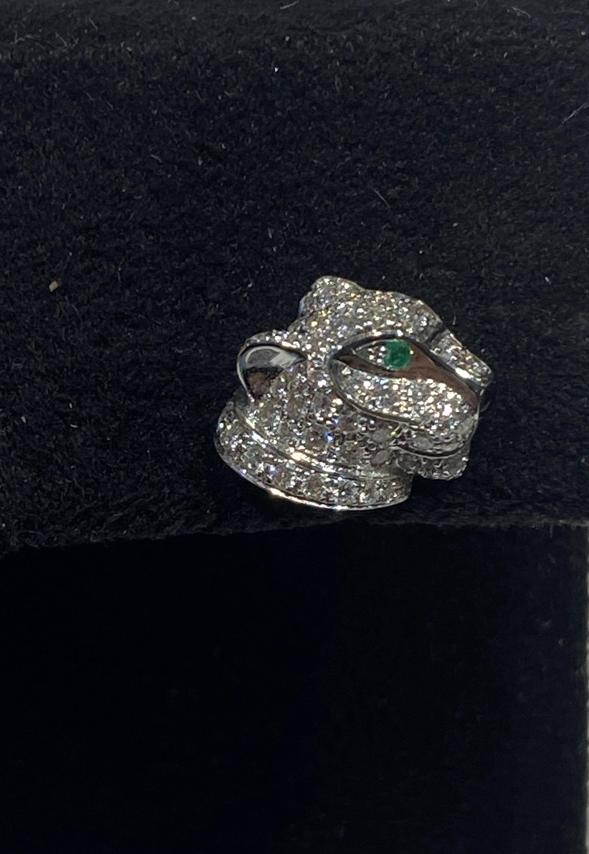 Panthère de Cartier earrings, 18K white gold (750/1000), black lacquer, set with tsavorite garnets, onyx, and five brilliant-cut diamonds totaling 0.01 carat

These earrings are engraved/stamped with the Cartier logo and UL 8218.
Measurements are