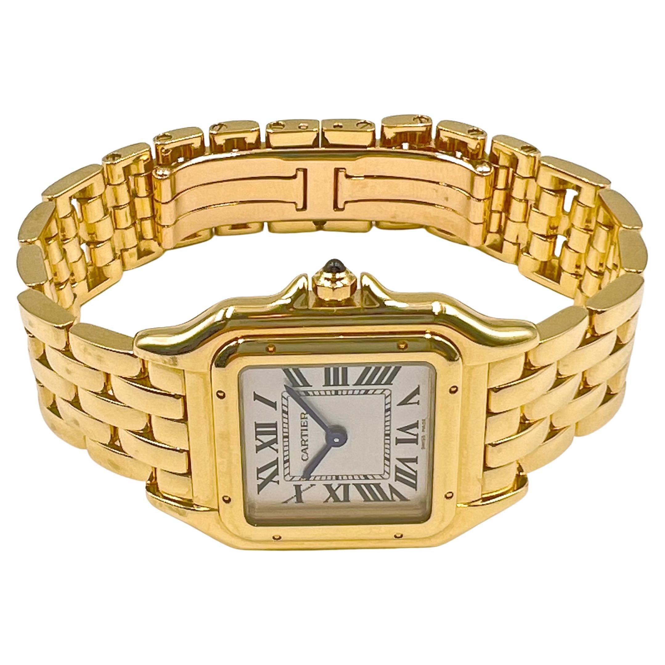 Pre-owned ​Panthere de Cartier medium-sized wristwatch (ref. WGPN0009), featuring a Swiss-made quartz movement; silvered dial with black Roman numerals & blued-steel, sword-shaped hands; and 37 x 27mm, 18k yellow gold case on an 18k yellow gold link
