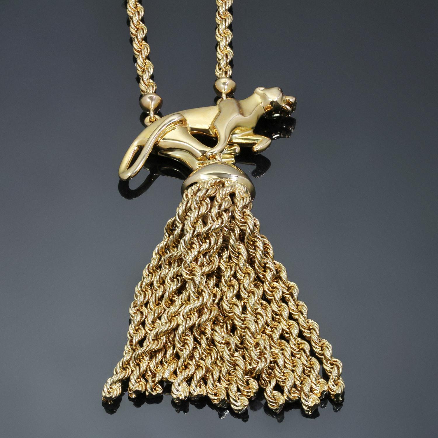 This gorgeous rare Cartier necklace features a long chain and an iconic running panther pendant with a tassel crafted in 18k yellow gold. Made in France circa 1980s. Measurements: 21