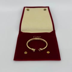 Bracciale Panthere De Cartier con granato di tsavorite e onice in oro giallo 18 ct.