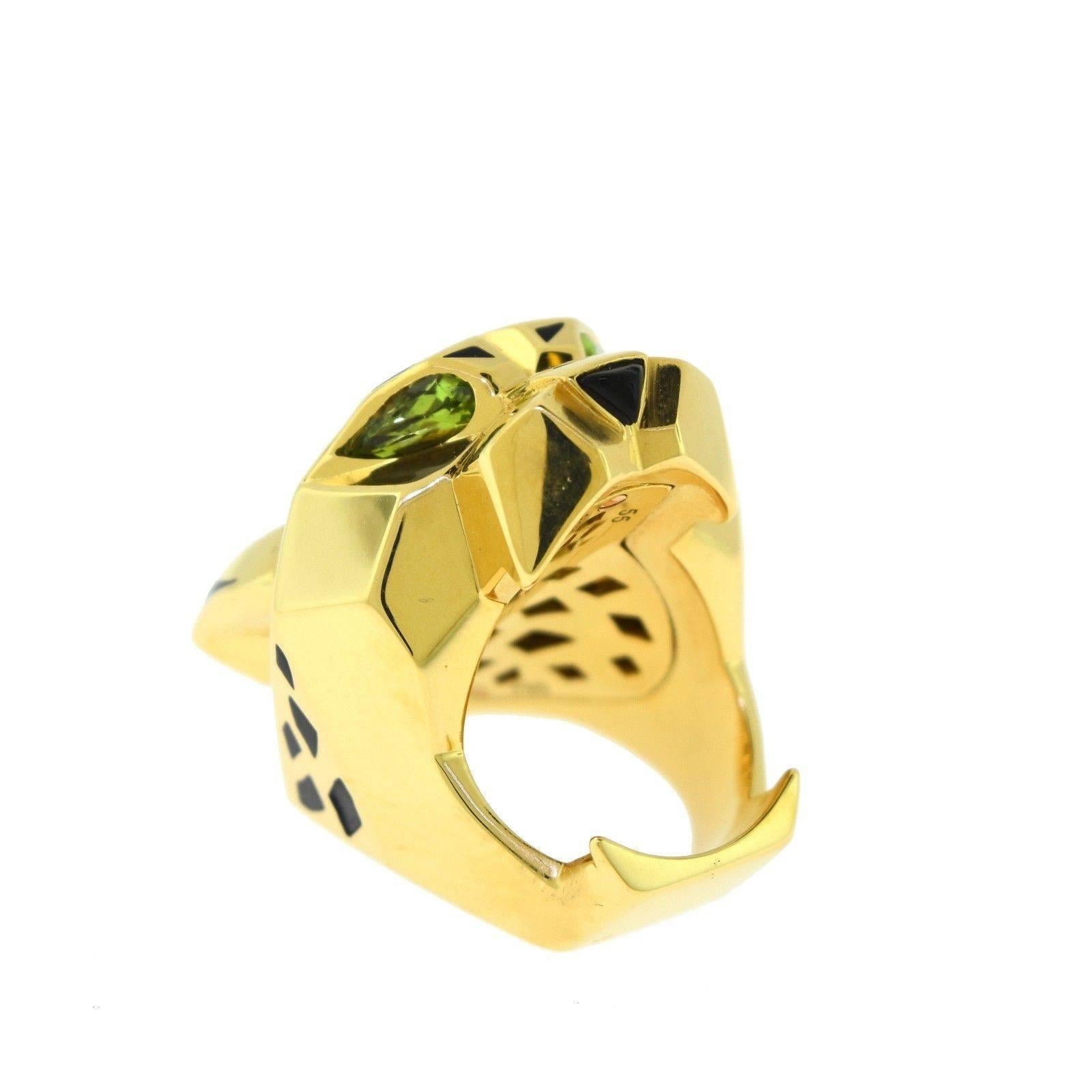Set in 18k Yellow Gold, this Cartier ring from the Panther collection is a MUST. With Onyx and Peridot stones, the ring weighs a total of 63.0 grams and is a size 55 in euro sizes and 7.25 in US. 