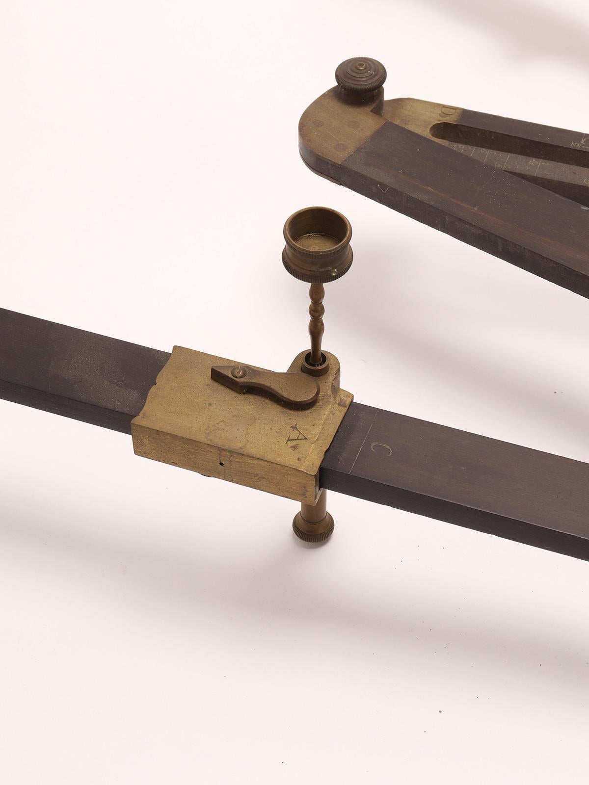 Brass and ebony pantograph, in its original mahogany box. Bone wheels. The instrument shows the signature of the maker Lennel à La Sphére à Paris. France, 1780.