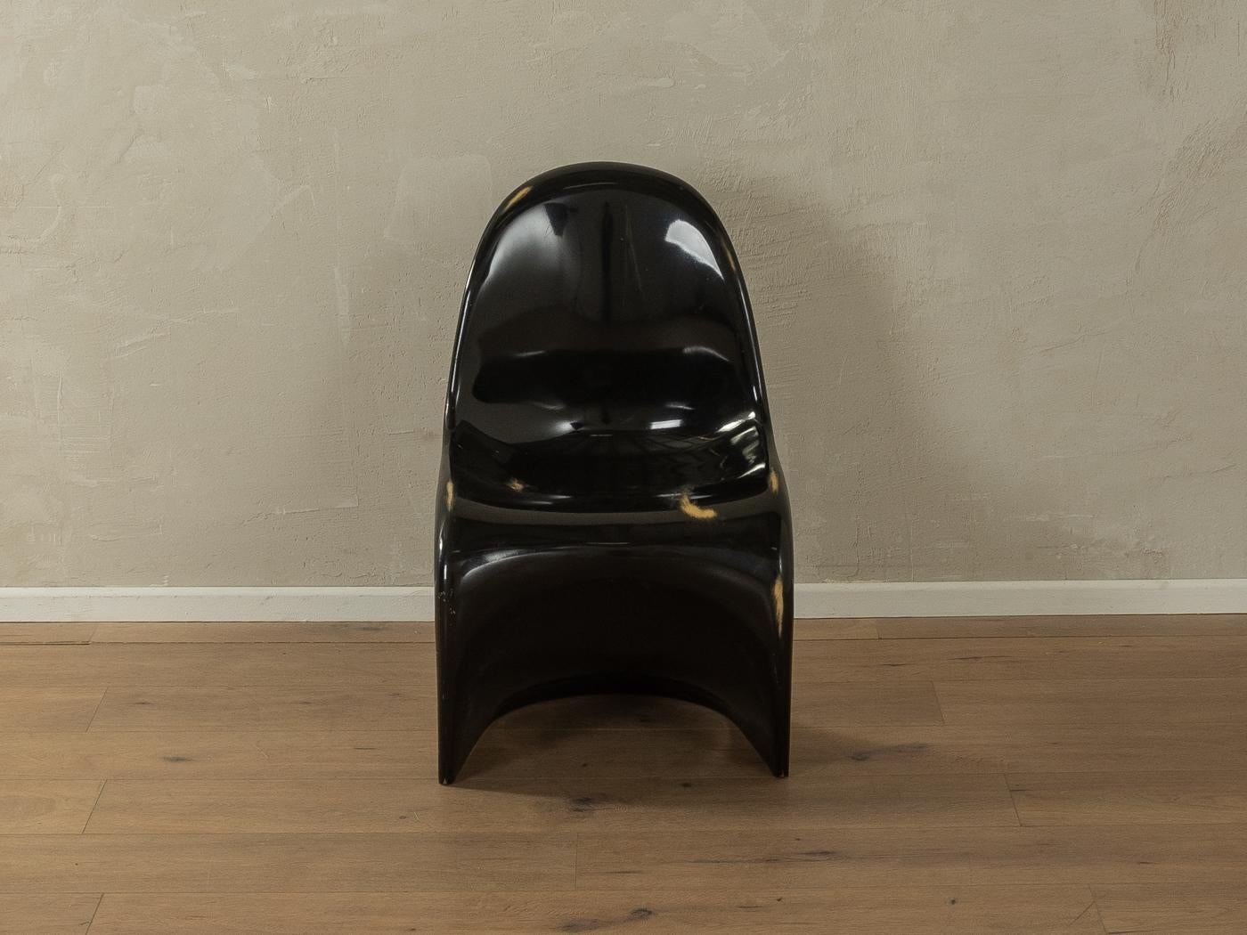Timeless cantilever Panton Chair of the second generation (1968-71) designed by Verner Panton in 1959. High-quality corpus in black made of polyurethane hard foam. Unique, almost untouched condition.

Quality Features:
accomplished design: perfect