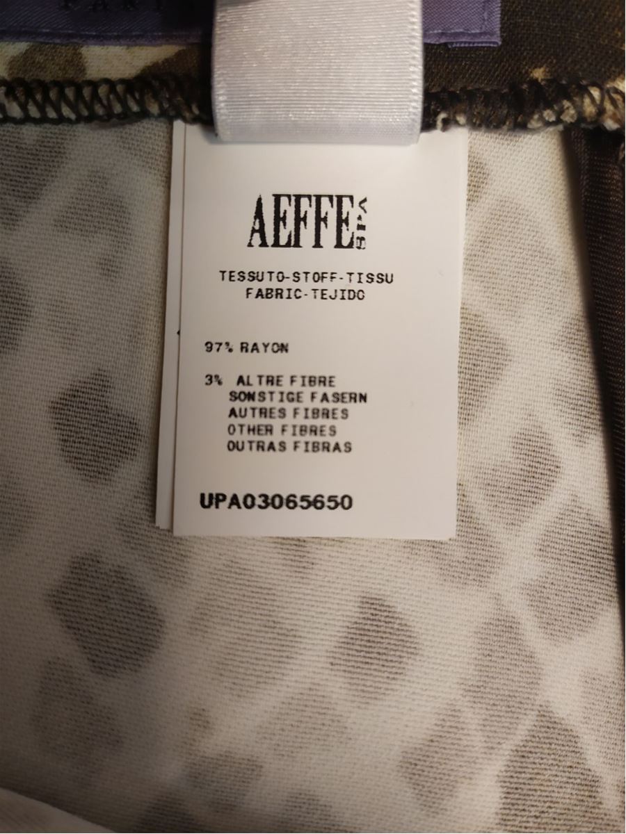 Rayon (97%) Other fibres (3% Cream white base color Multicolor animalier fancy Zip inside the ankles Total length cm 100 (3937 inches) Waist cm 37 (1456 inches)
