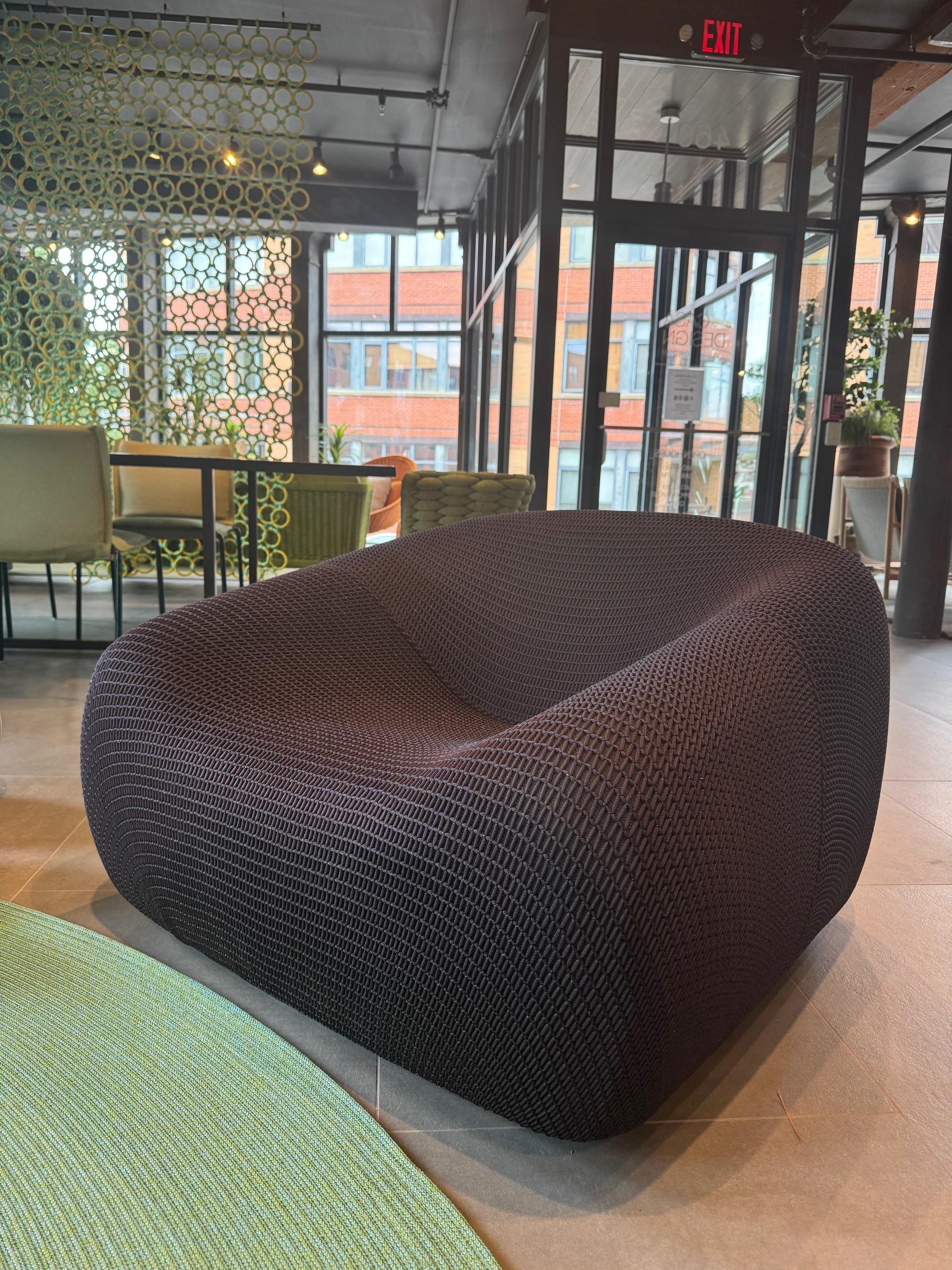 Smile Outdoor Armchair designed from Paola Lenti
Made for Outdoor use but can be used for interior environments.

Base for fixed armchair: thermoformed plastic material complete of spacers. The base is provided with handles to make the piece