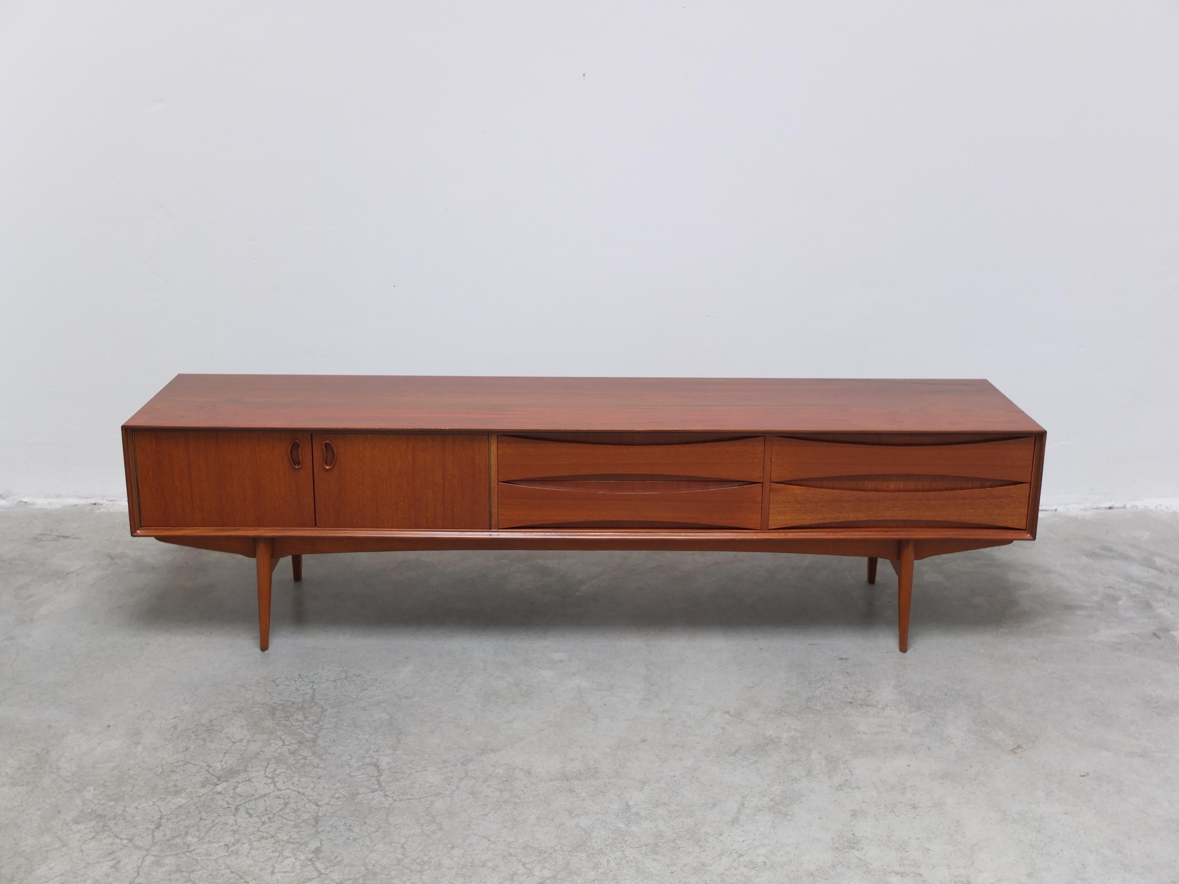 Beautiful model 'Paola' lowboard designed by Oswald Vermaercke for V-Form in 1959. It was named after the Belgian queen Paola who married Albert II the King of Belgium in the same year. This particular example is rare low version which sets it apart