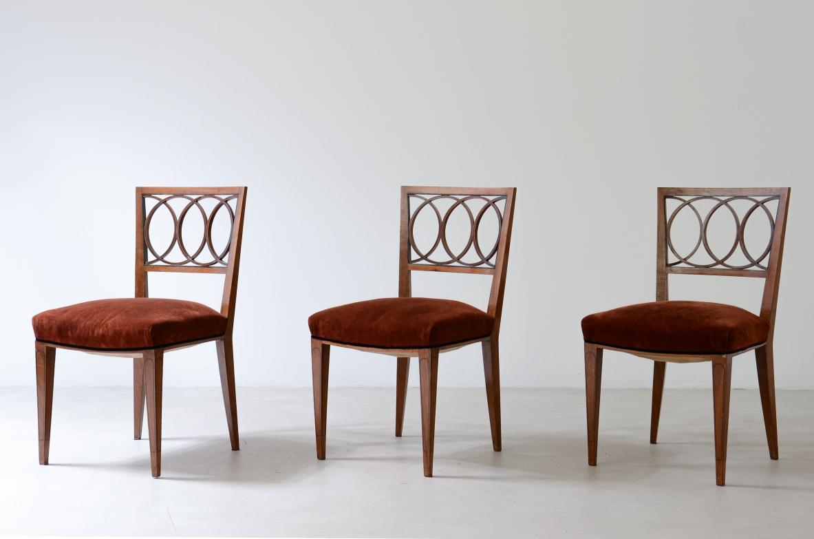 COD-Z200
Paolo Buffa 8 elegant walnut chairs with ebony fillets and open backs.

Lietti manufacture  late1930s

Provenance Domus Livia, Gio Ponti 1933/1938

48 x 50 h 90 seduta 47