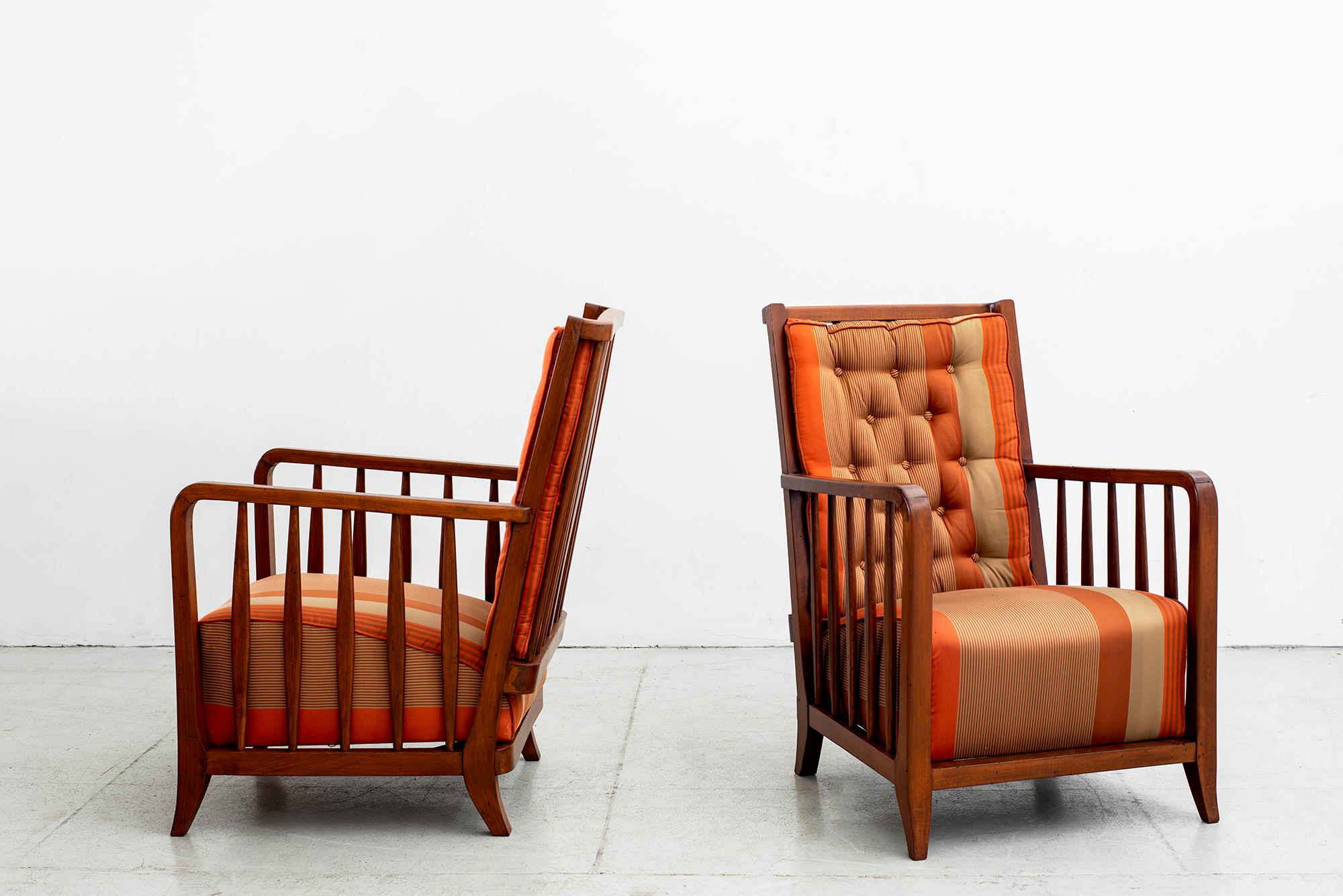 Pair of Paolo Buffa armchairs, Italy, circa 1940s
Wood spindled back and arms 
Sculpted armrests and tapered legs.
 