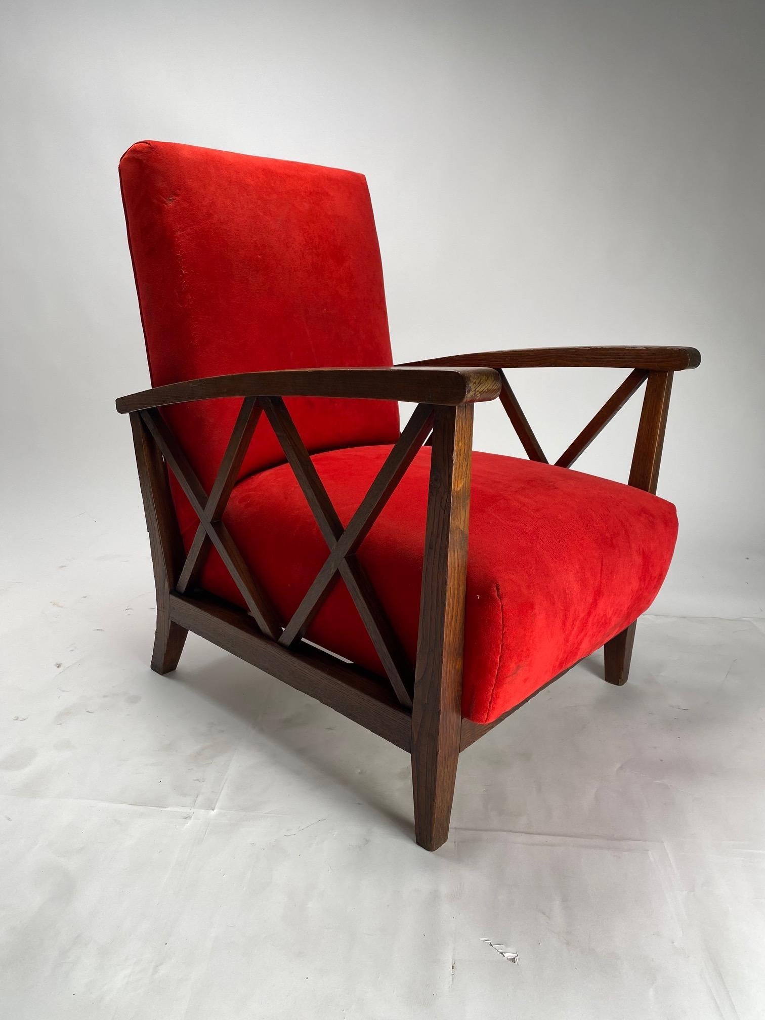 Pair of Mid-Century modern Armchairs with wooden structure and red fabric cushion, in the style of the Milanese architect Paolo Buffa.

We have kept the original fabric but we can customize the armchairs in the color and type of fabric preferred by