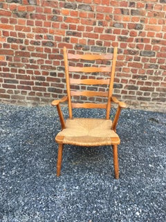 Paolo Buffa 'Atribuido a' Pareja de sillones italianos de madera de cerezo y paja