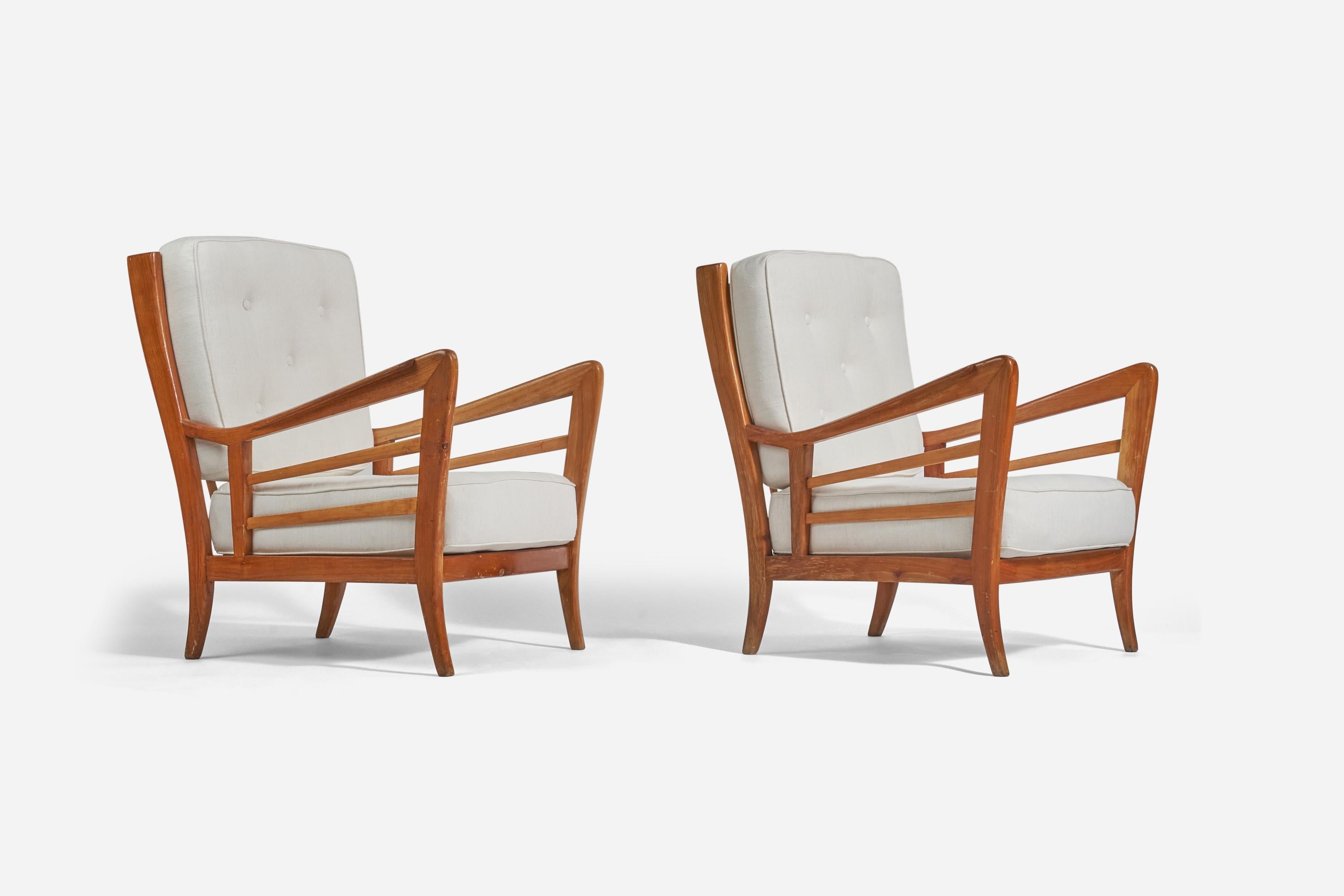A pair of wood and white fabric lounge chairs; design and production attributed to Paolo Buffa, Italy, 1940s.