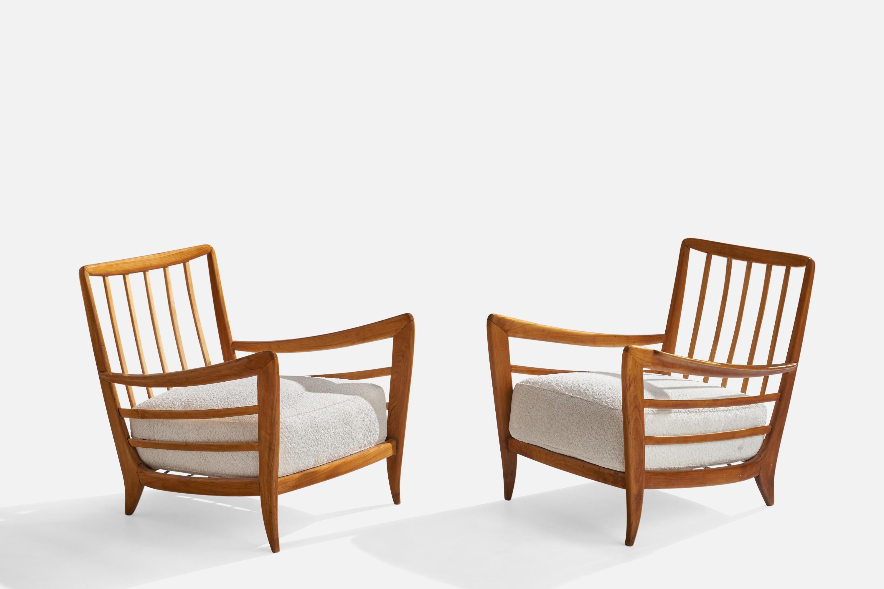 A pair of walnut and white fabric lounge chairs attributed to. Paolo Buffa, Italy, 1940s.
