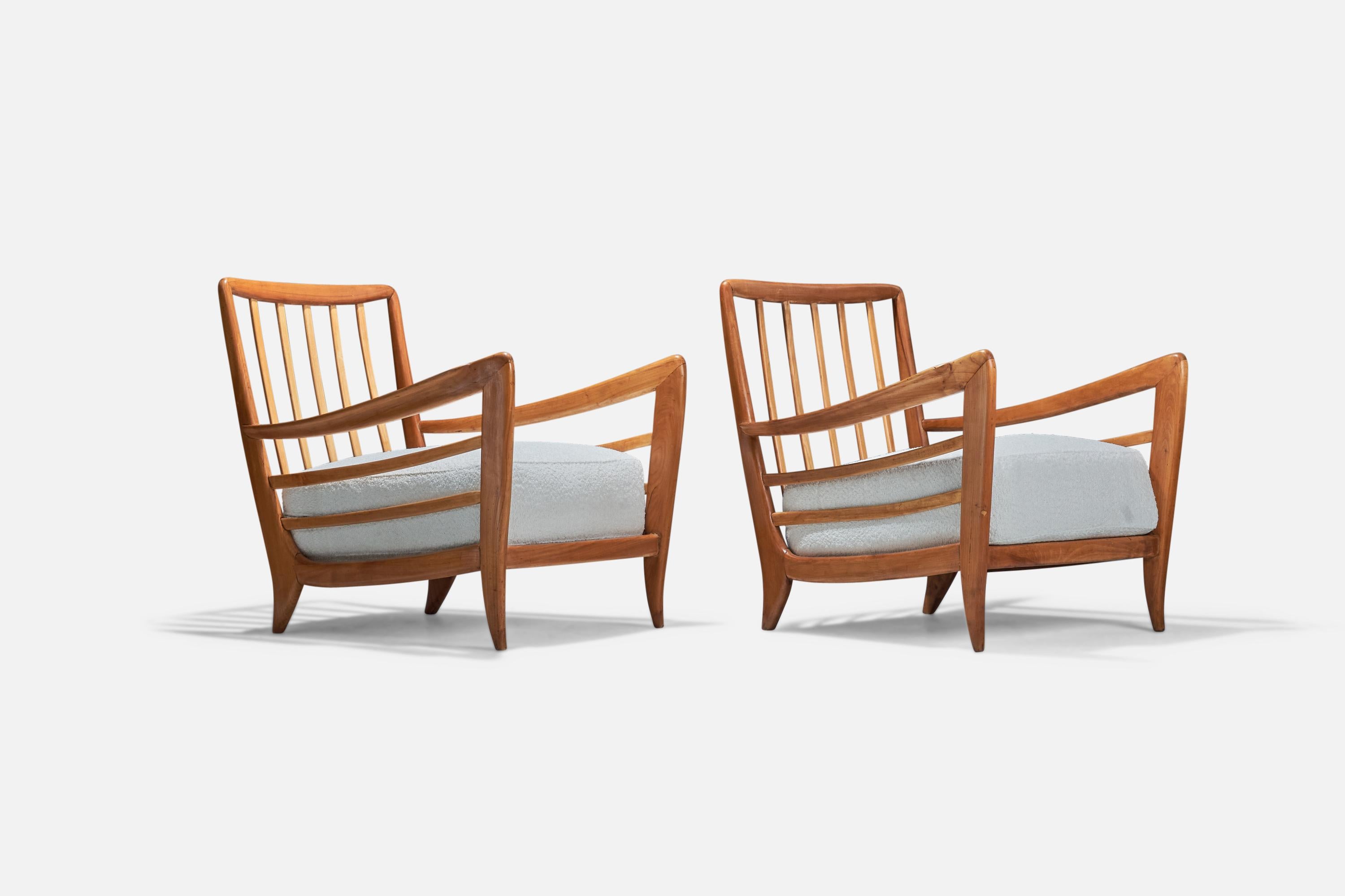 A pair of walnut, fabric lounge chairs designed and produced by Paolo Buffa Attribution, Italy, 1940s.