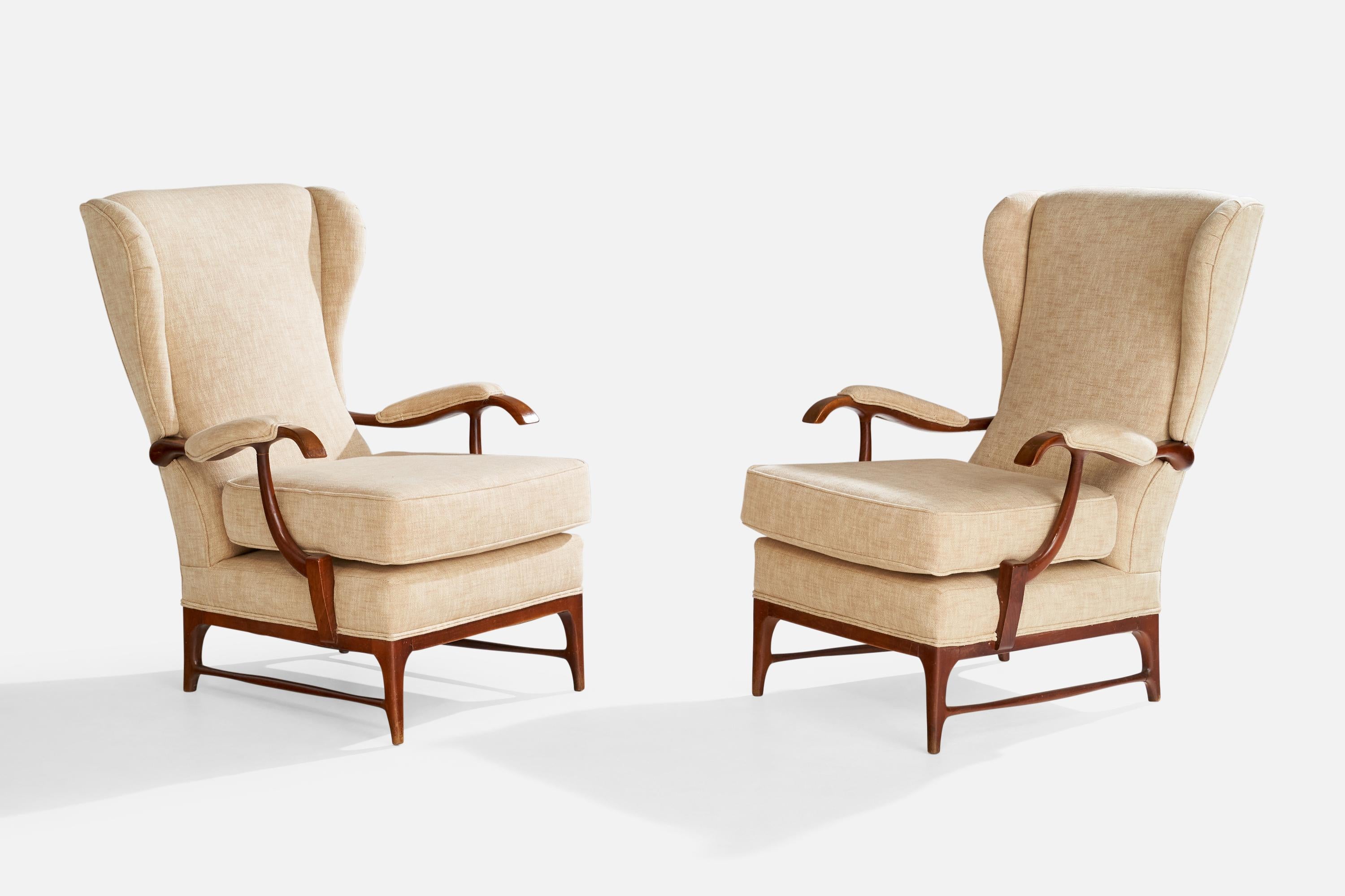 A pair of dark-stained wood and cream-white fabric lounge chairs designed and produced in Italy, c. 1950s.

Dimensions: 39.625” H x 28.5” W x 35.5” D

Seat Height (inches): 18.5