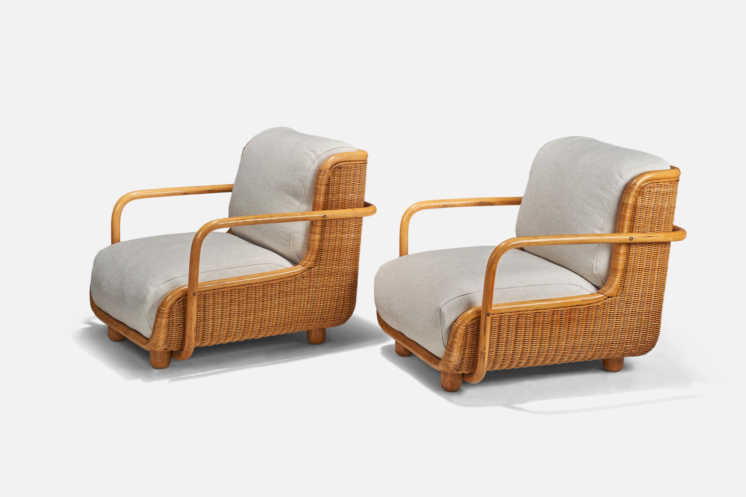 A pair of wood, rattan and fabric lounge chairs, design attributed to Paolo Buffa, Italy, 1940s.