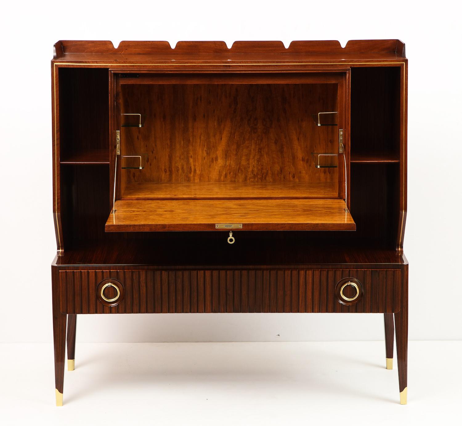 Paolo Buffa rare drop-front bar cabinet. Rosewood cabinet with light wood inlays, produced by Serafino Arrighi, Cantú. Drop-front panel opens to reveal burled wood interior and glass shelves. This Buffa cabinet also features open storage