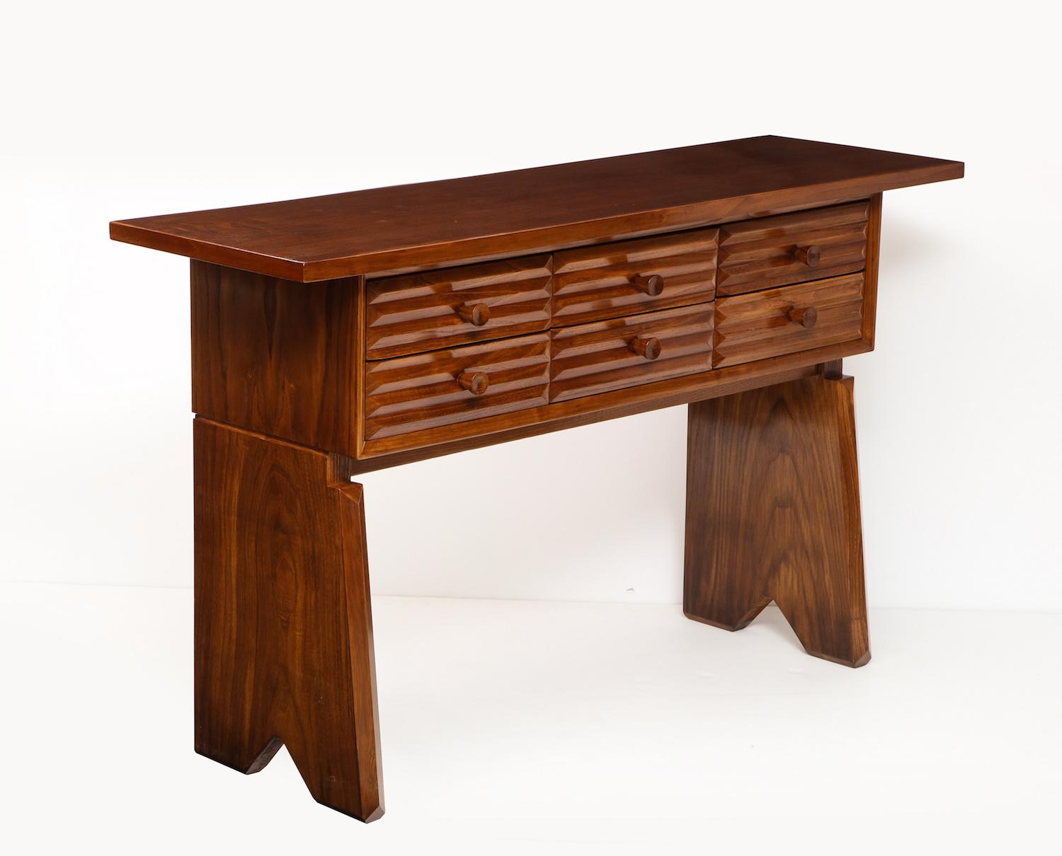 Rare console table/ server by Paolo Buffa. Produced by Serafino Arrighi, Cantú. Table features ash veneer, with carved wood details, over-hanging slab wood top. 6 drawers with craved front relief and conical wood pulls. A fantastic example of