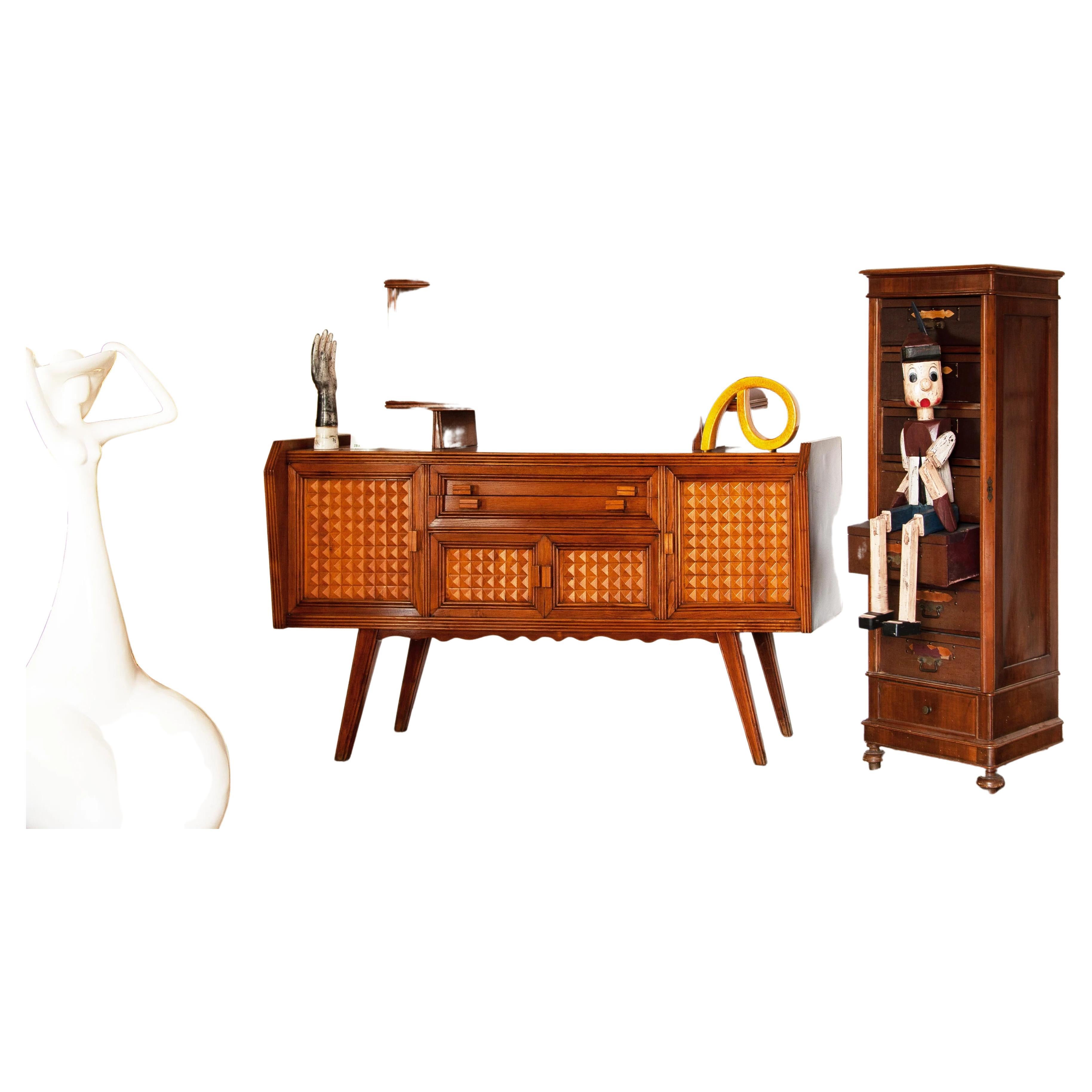 Paolo Buffa's wooden credenzas from the 1950s are exceptional examples of his talent as a designer and craftsman in the field of furniture and interior design. During this period, Paolo Buffa created several furniture masterpieces that embodied a