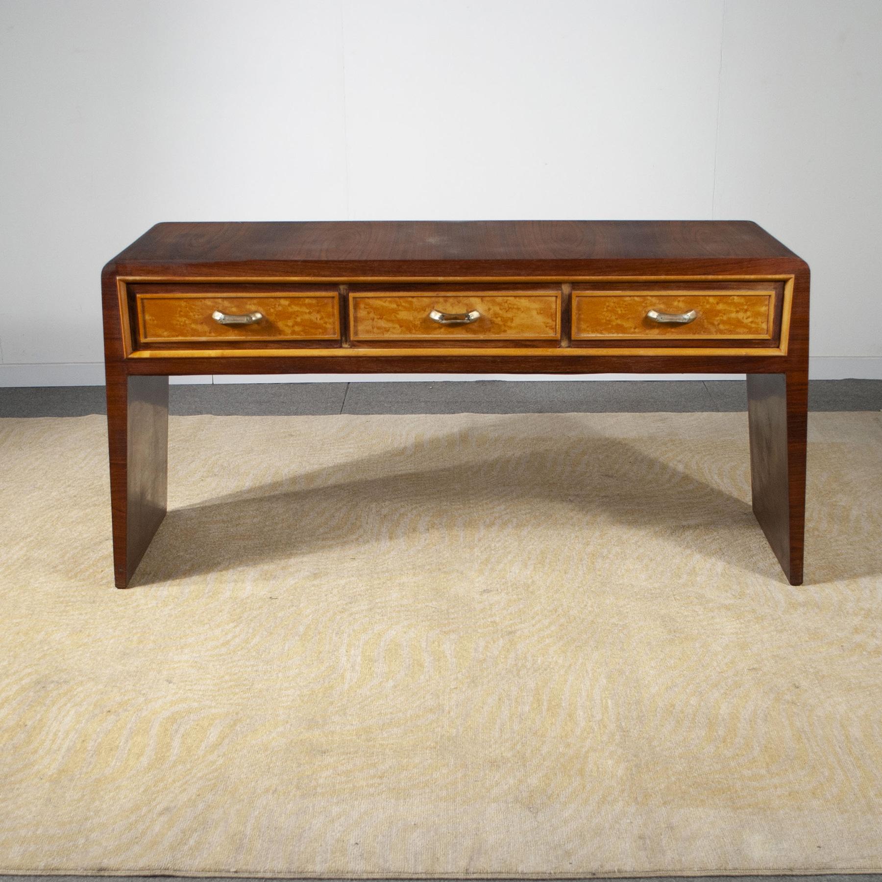 Beautiful three-drawer console with clean and rational lines Paolo Buffa production late 1940s.


In his long professional activity, Milanese architect Paolo Buffa (1903-1970) tried his hand at designing homes and offices, naval furnishings, and