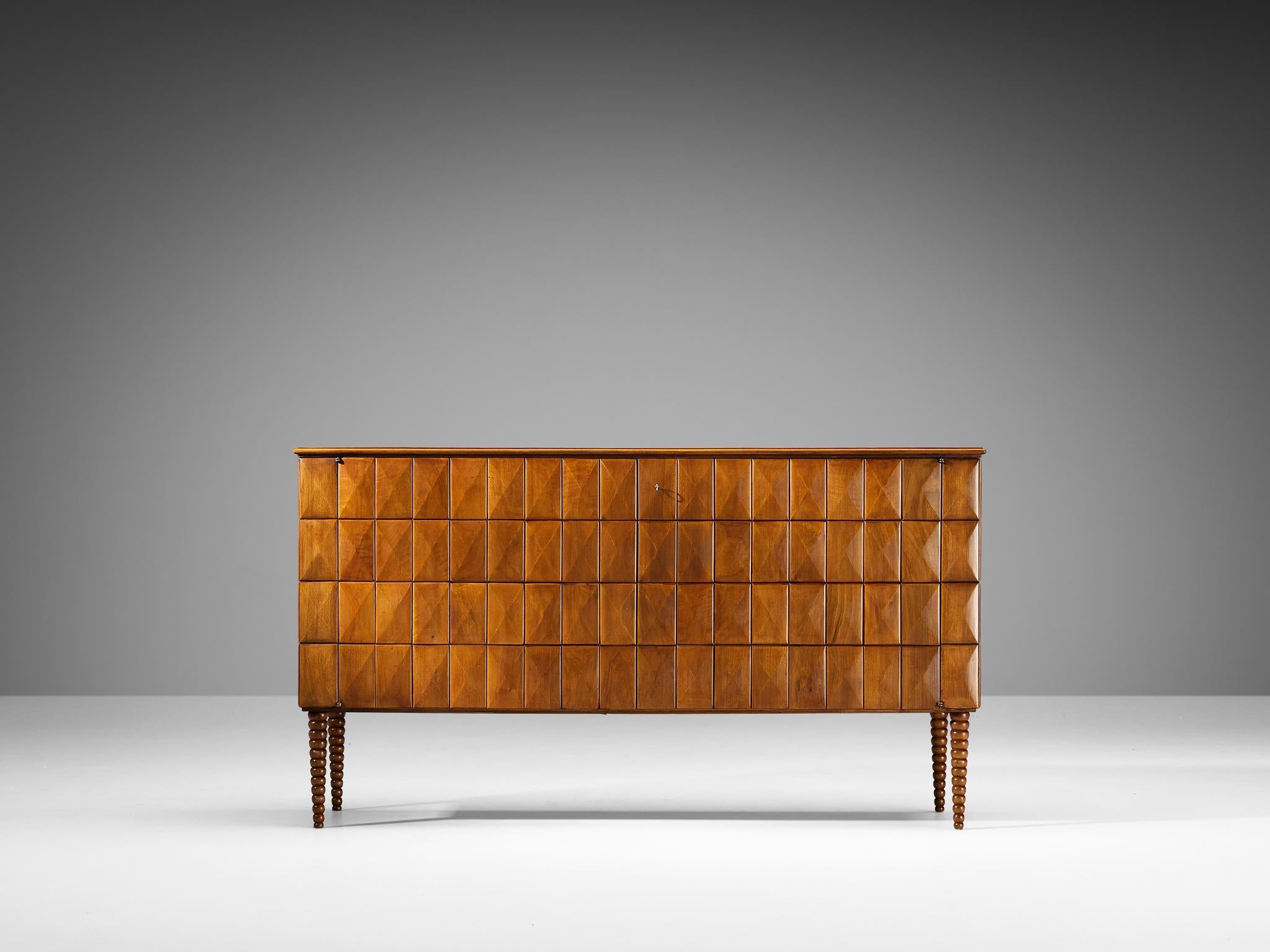 Paolo Buffa sideboard, walnut, brass, Italy, circa 1950

An outstanding piece that breathes sophistication and craftsmanship. Designed by Paolo Buffa in the 1950s, this piece clearly shows the talent of the architect and designer. This cabinet is