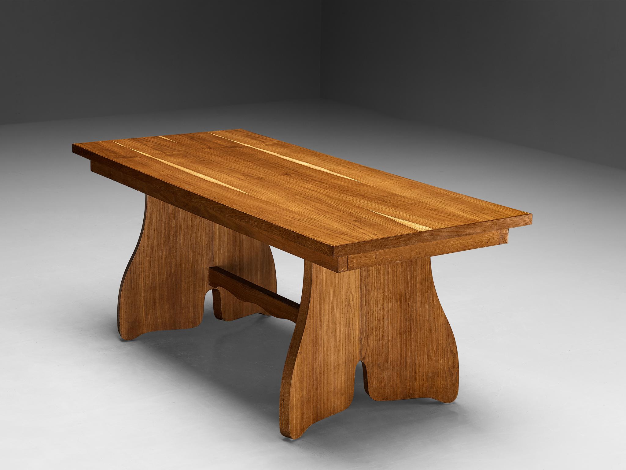 Paolo Buffa for Esposizione Permanente mobili Cantù, dining table, oak, Italy, 1940s

A truly remarkable piece of furniture that excels in every aspect of design: from its impeccable execution and charmingly crafted carvings to its craftsmanship and