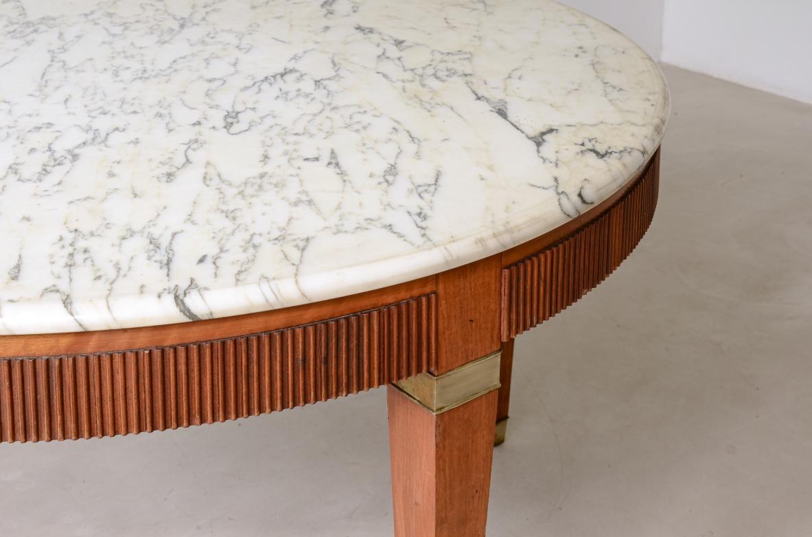 Mid-Century Modern Extraordinary four-legged table with brass capitals and tips For Sale