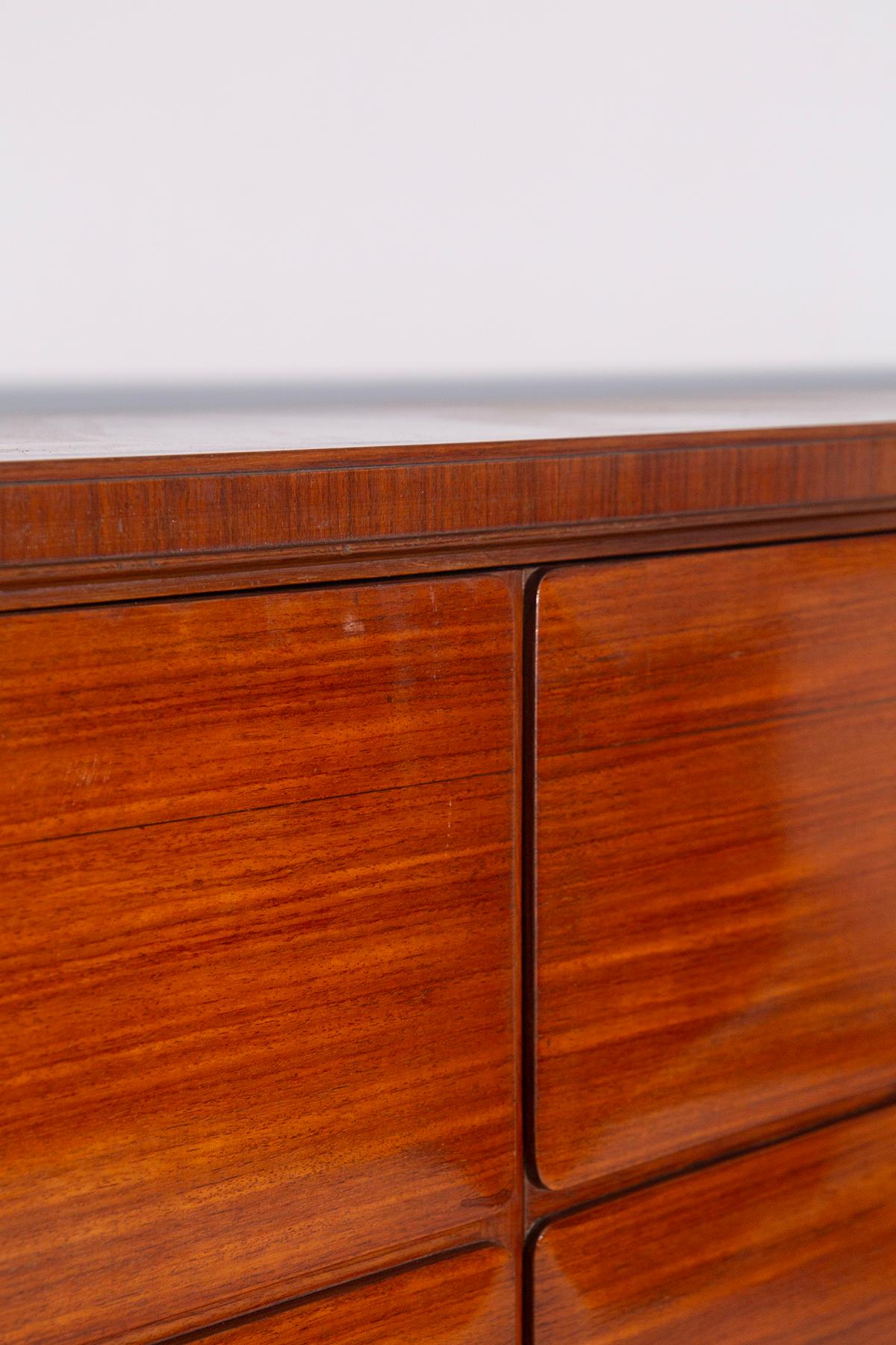 Large sideboard by Paolo Buffa 1950s on Arrighi execution. 5 doors formed with elegant ashlar execution. Inside we find shelves, in the right side glass shelf and grissinated drawers. This extraordinary Italian sideboard from the 1950s is to the